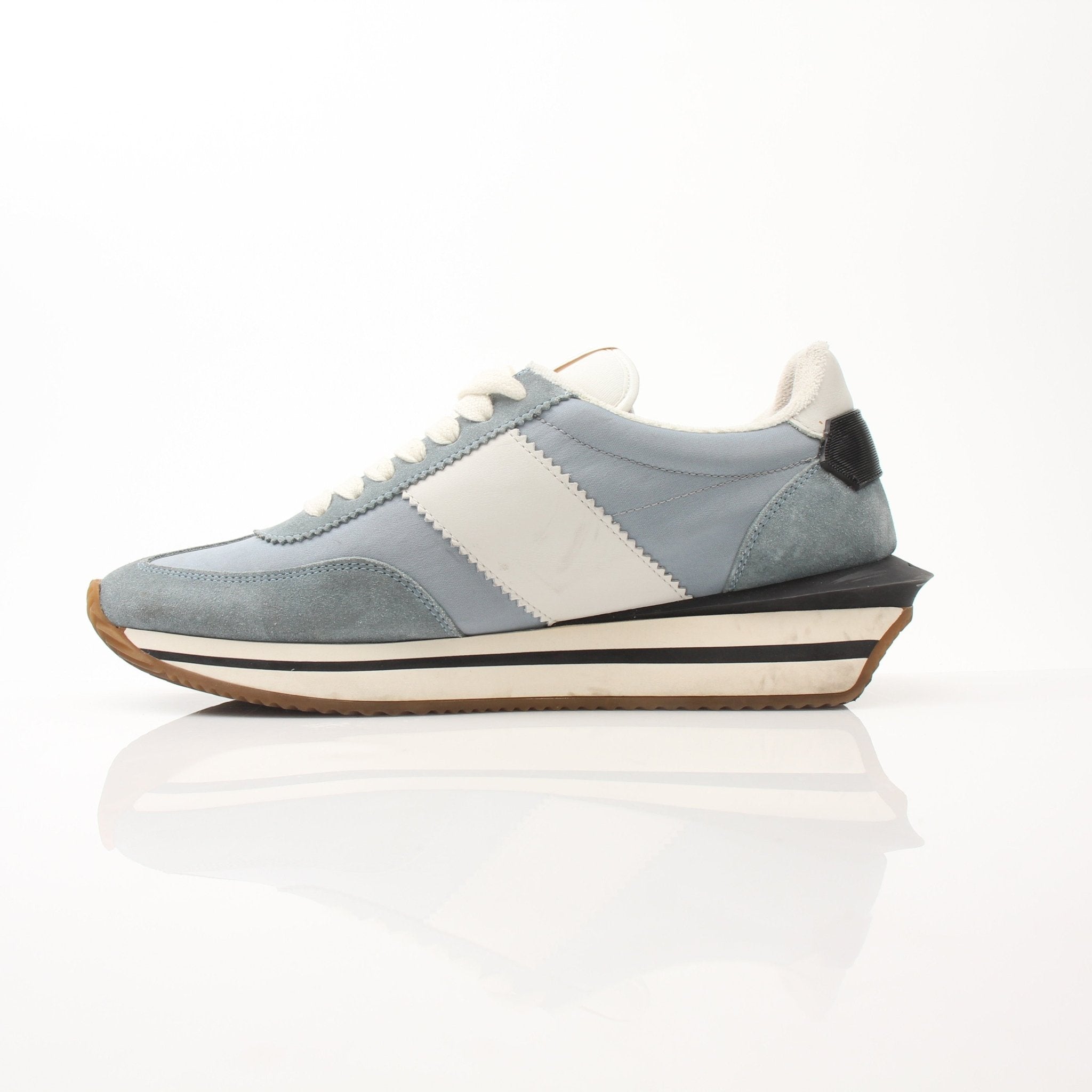 Gold & Beyond Tom Ford trainers shoes with sleek design, white laces, and stylish details, perfect for casual or athletic wear.