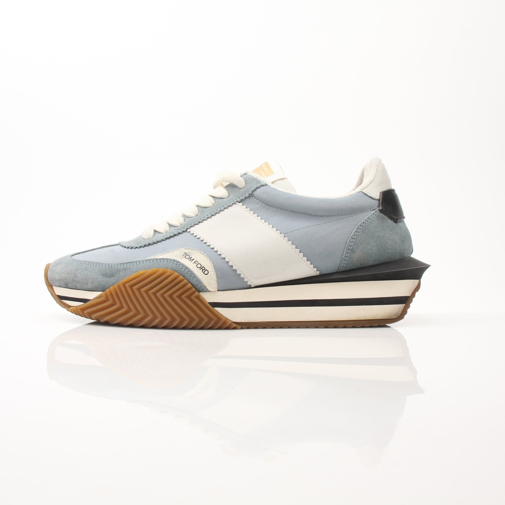 Gold & Beyond Tom Ford trainers, stylish shoes with sleek design and premium materials, shown on a white background.