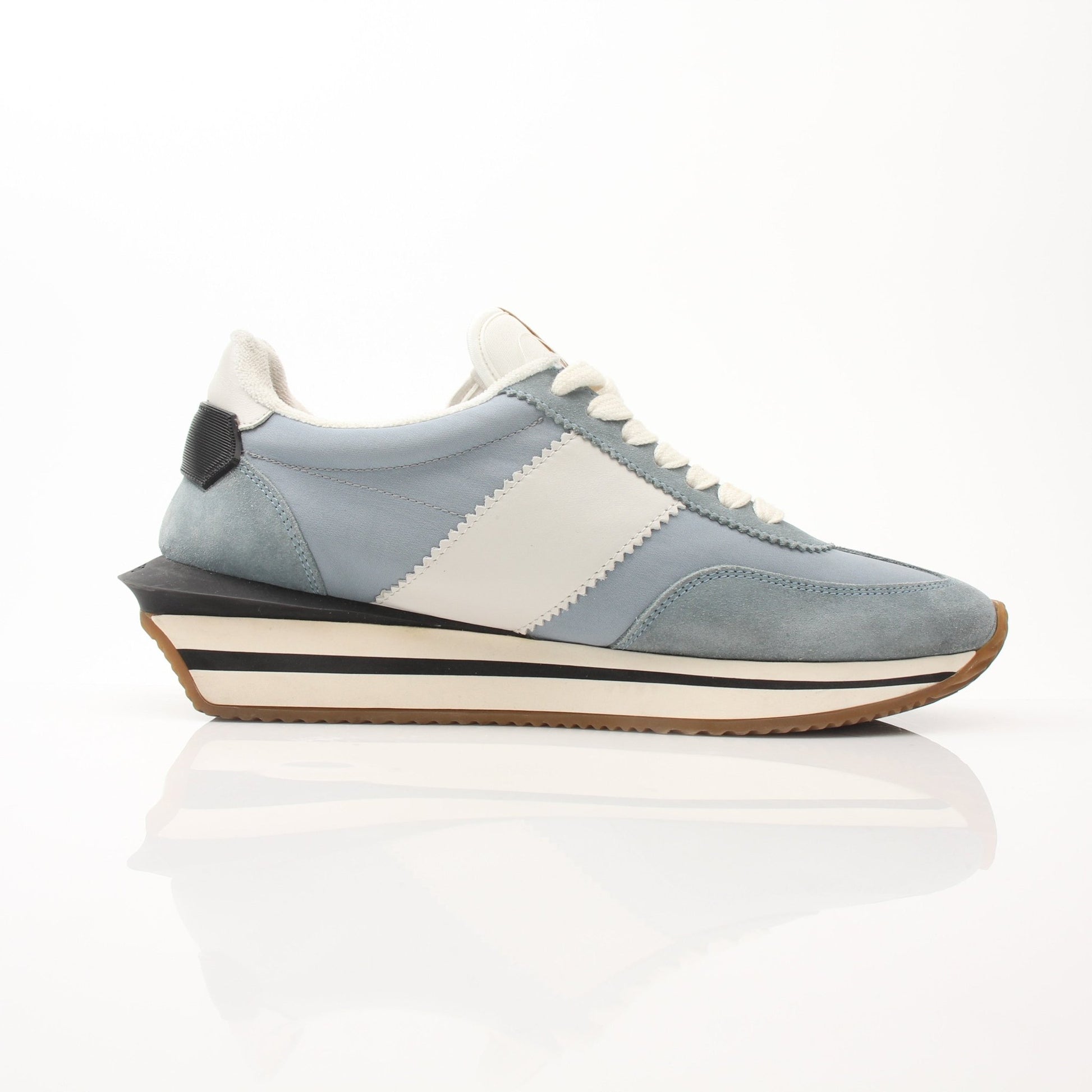 Gold & Beyond Tom Ford trainers, stylish men's shoes with sleek design and premium finish, displayed on a white background.
