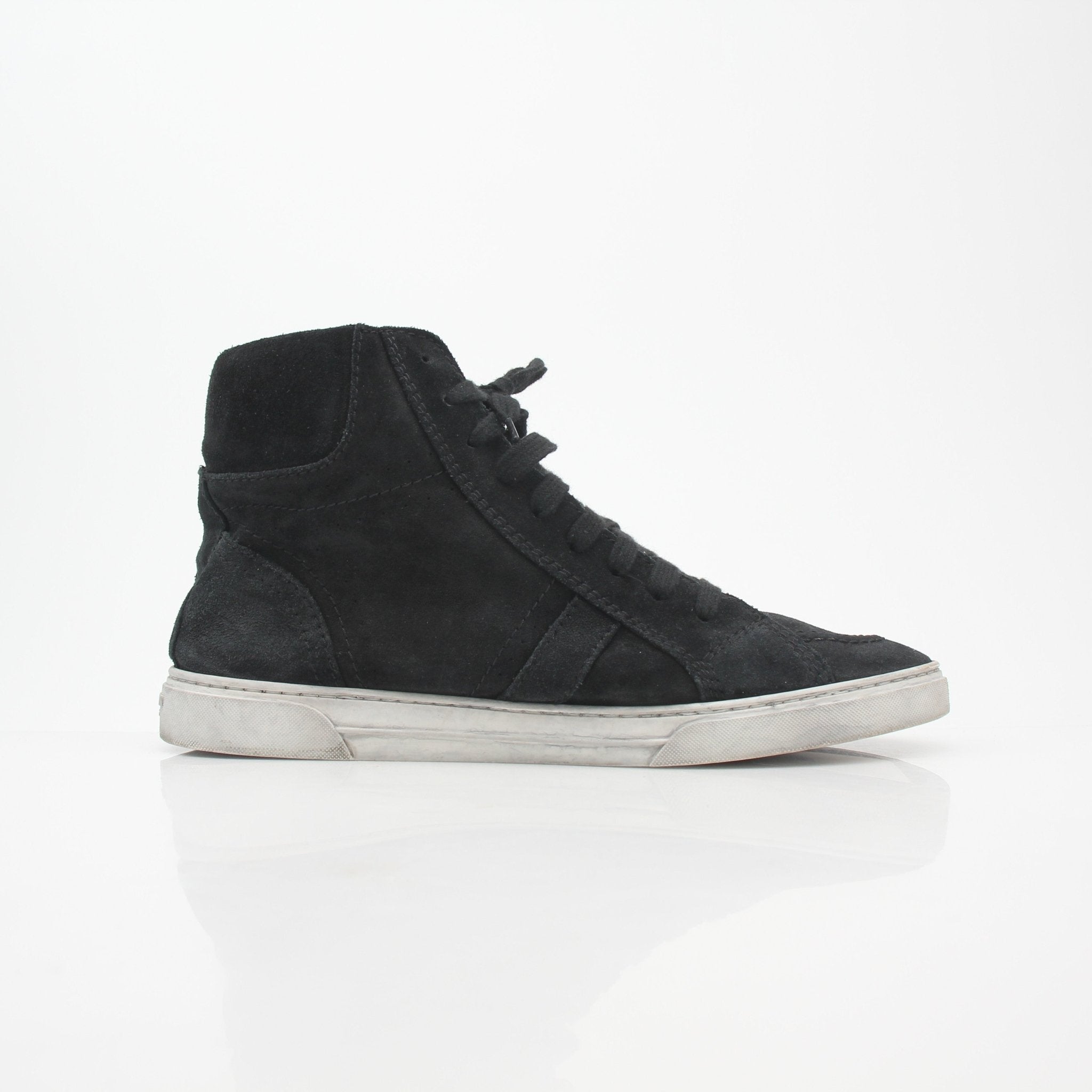 Black Joe suede high-top sneakers by Saint Laurent, featuring gold accents and a sleek modern design.