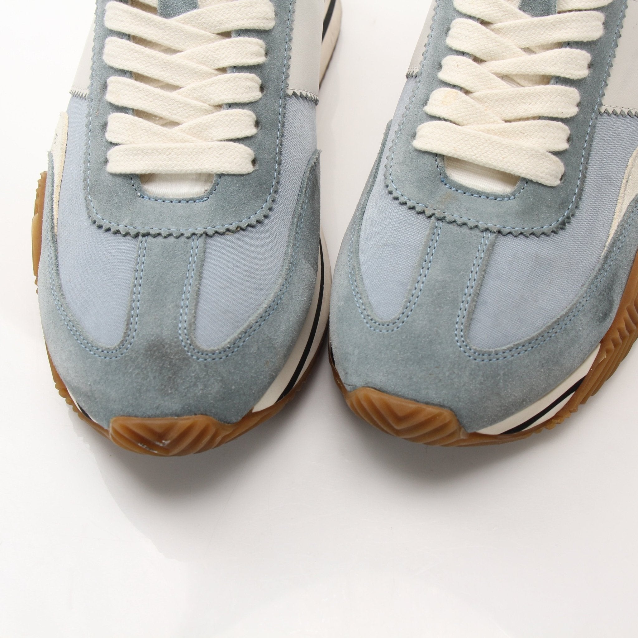 Tom Ford trainers, stylish shoes by Gold & Beyond, featuring sleek design and premium materials in the image.
