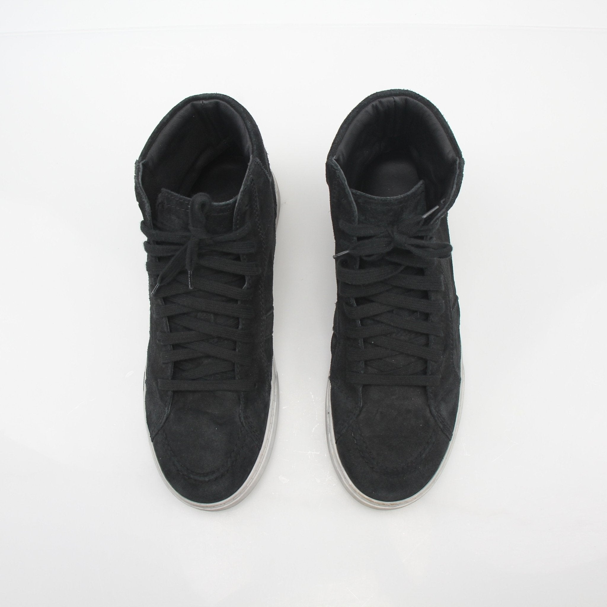 Gold & Beyond Saint Laurent Black Joe suede high-top sneakers with white rubber soles and laces, showcasing stylish shoe design.