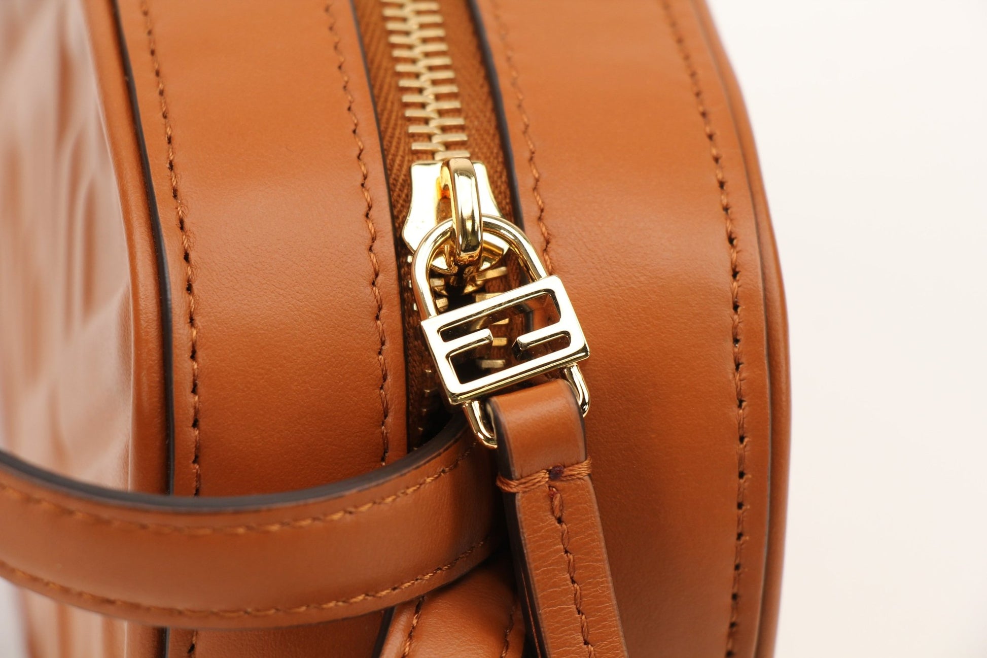 Fendi brown camera bag wallet by Gold & Beyond, featuring sleek design and compact size, with visible stitching and gold-tone accents.