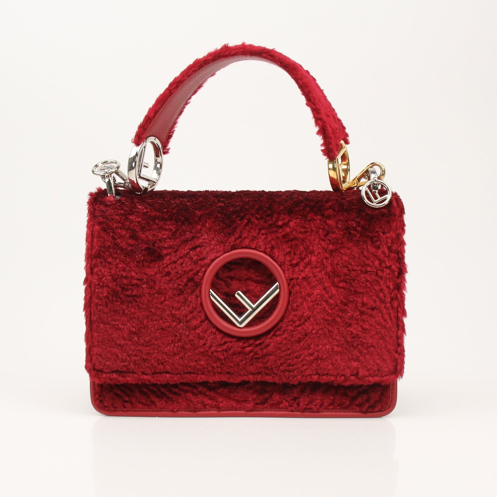 Gold & Beyond Fendi Kan I F velvet shoulder handbag with top handle and sleek design, ideal for stylish everyday use.