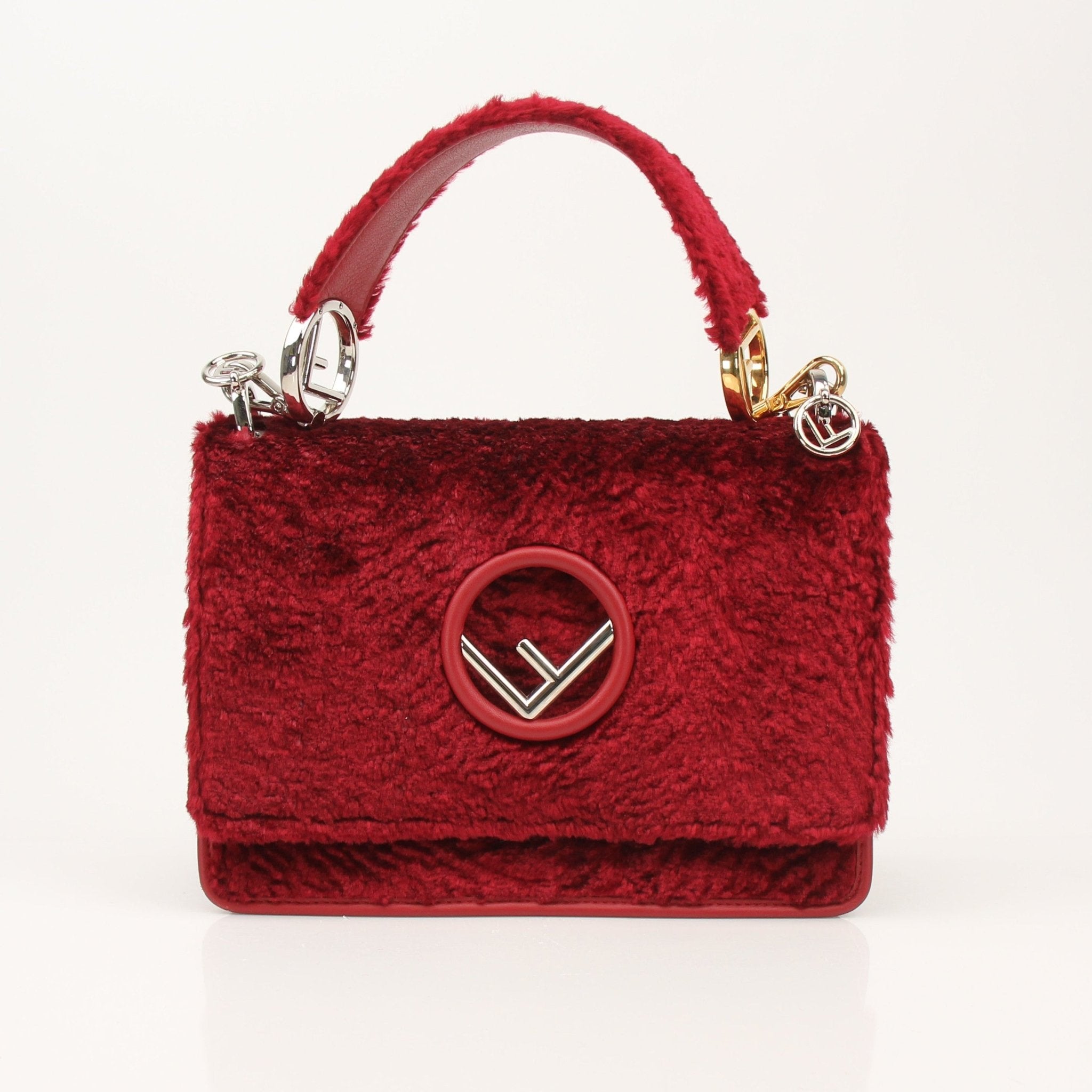 Gold & Beyond Fendi Kan I F velvet shoulder handbag with top handle and sleek design, ideal for stylish everyday use.