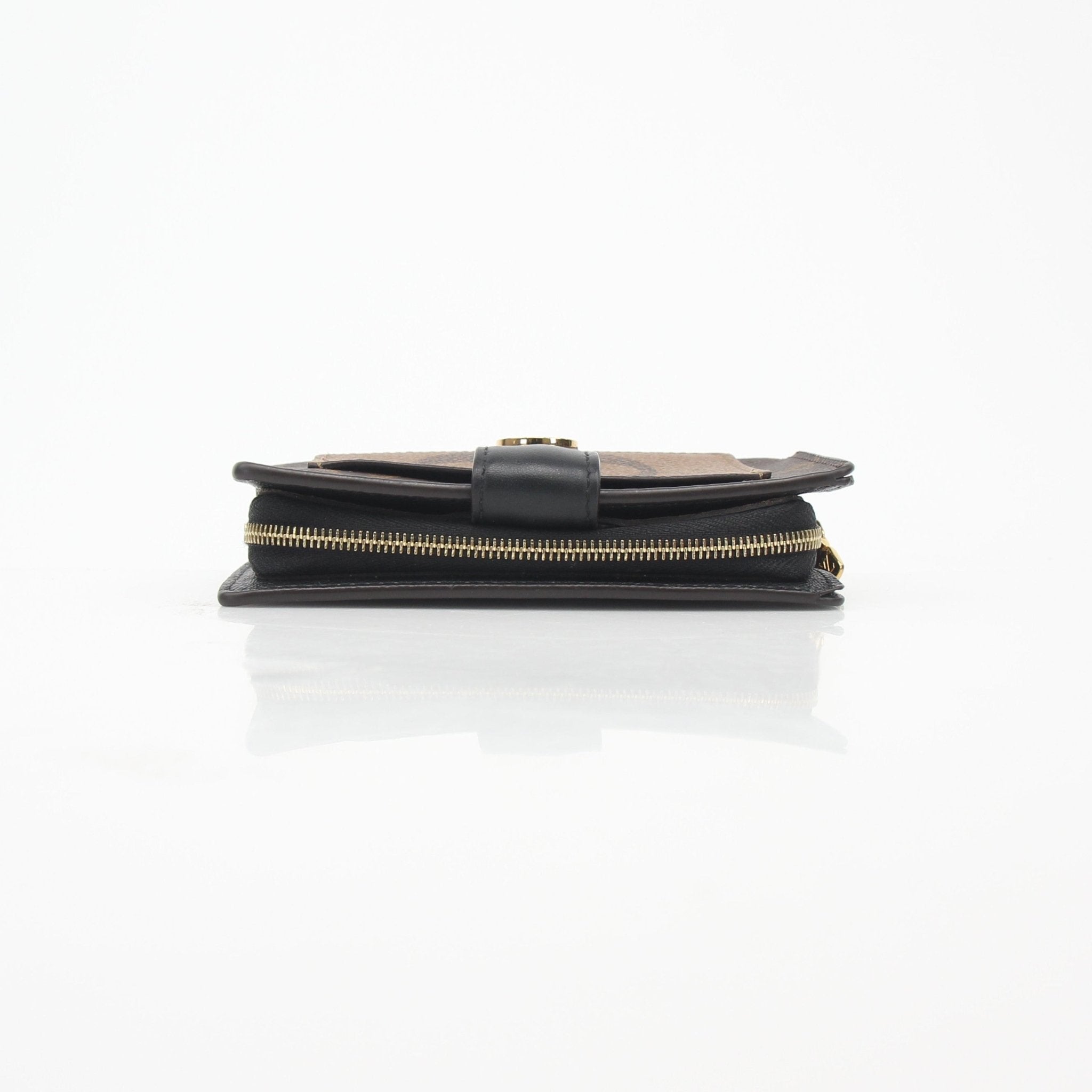 Louis Vuitton Monogram Reverse Juliette Wallet with gold hardware and multiple card slots, featuring the signature monogram design.
