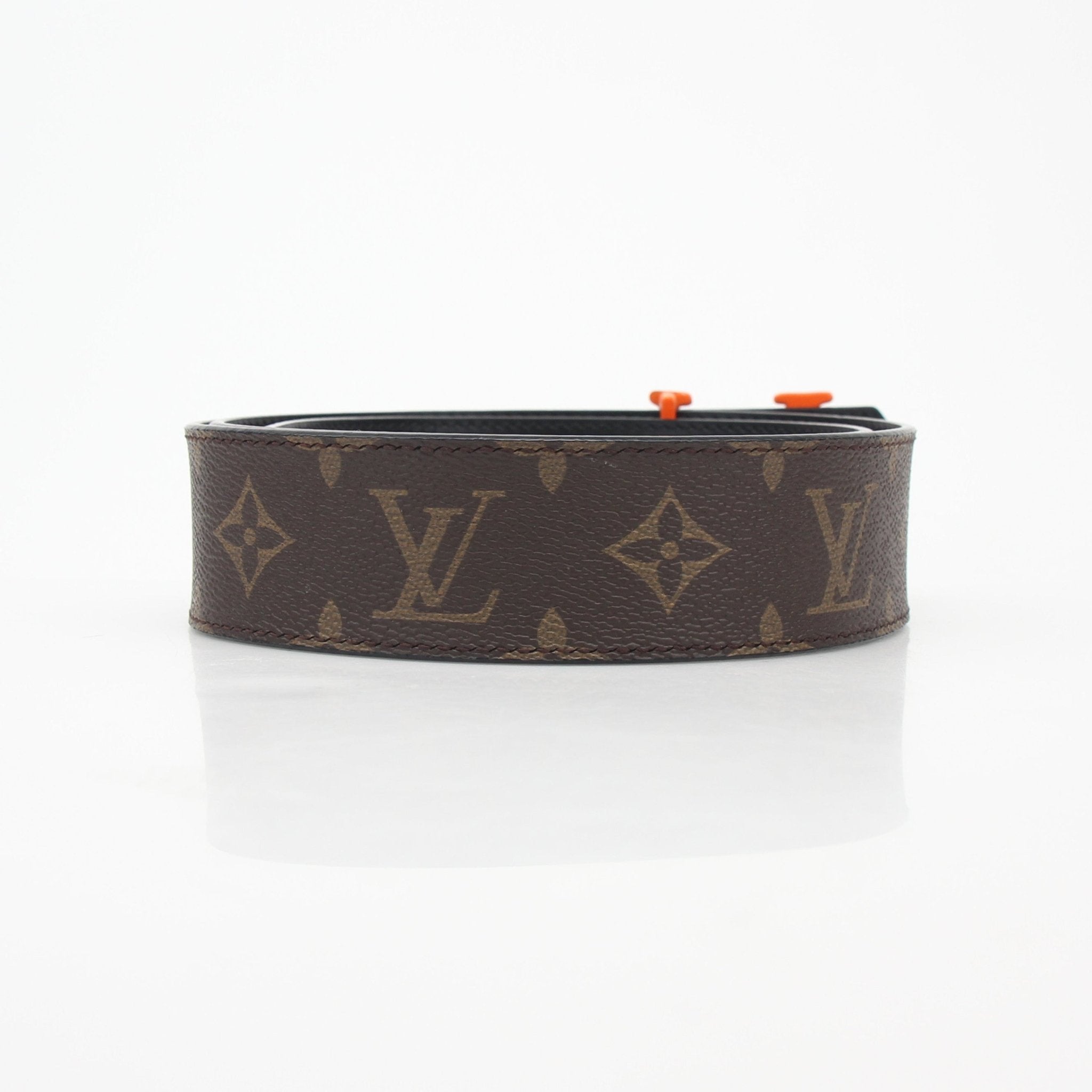 Louis Vuitton Monogram LV Shape 40mm belt with gold buckle, showcasing the iconic monogram pattern and stylish accessories design.