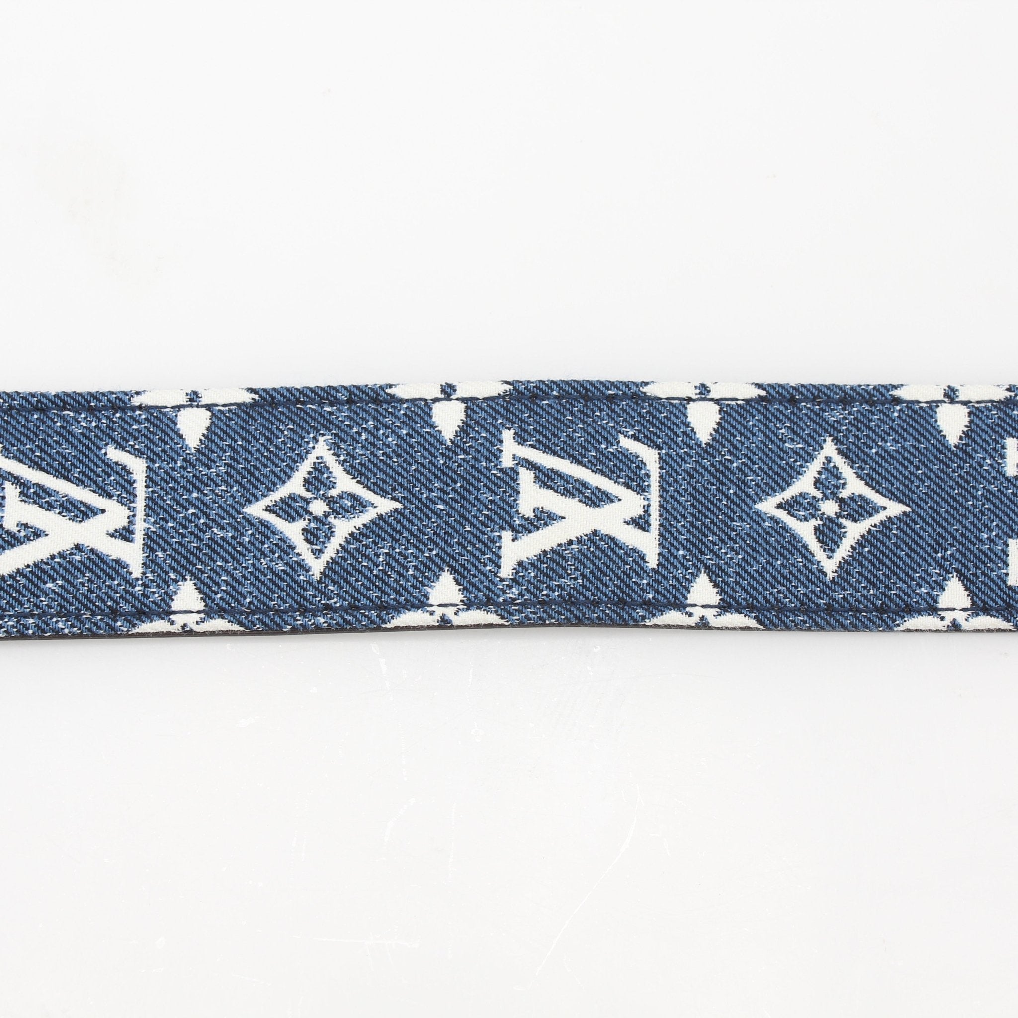 Louis Vuitton blue denim Jacquard Bandoulière shoulder strap with gold accents, designed for luxury accessories and bags.