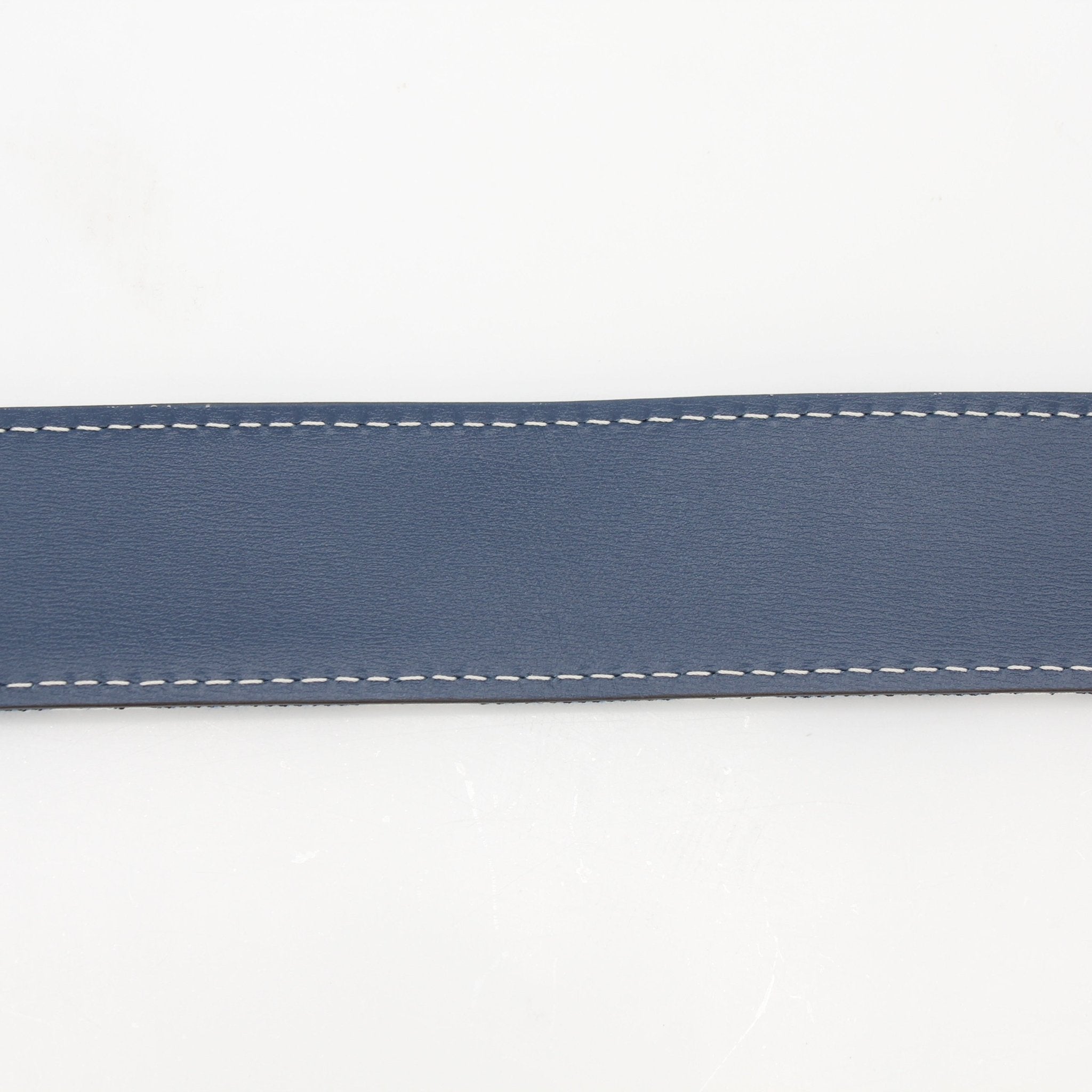 Louis Vuitton blue denim jacquard bandoulière shoulder strap for accessories, featuring detailed stitching and branded hardware.