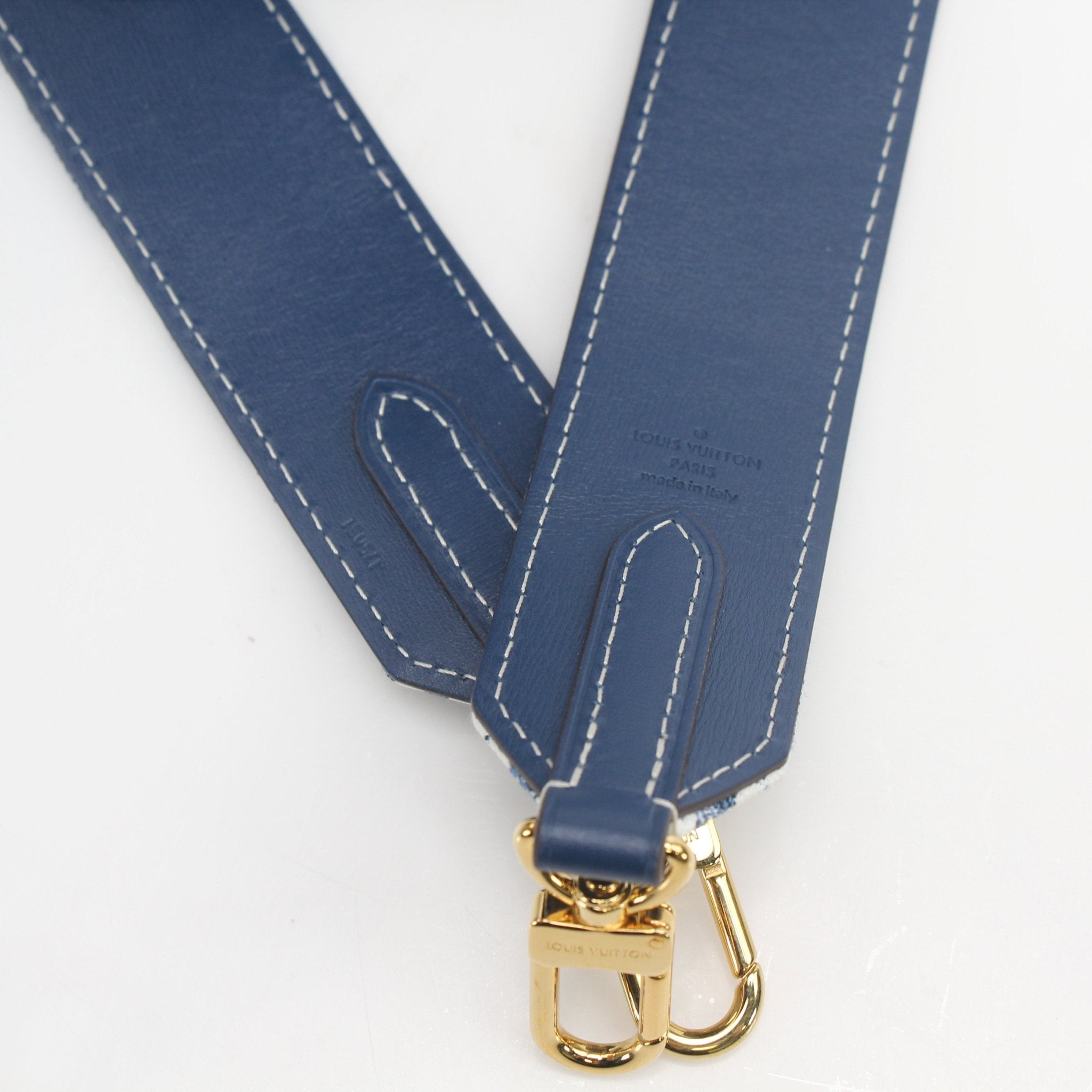 Louis Vuitton blue denim Jacquard Bandoulière shoulder strap for accessories, featuring detailed pattern and gold hardware accents.