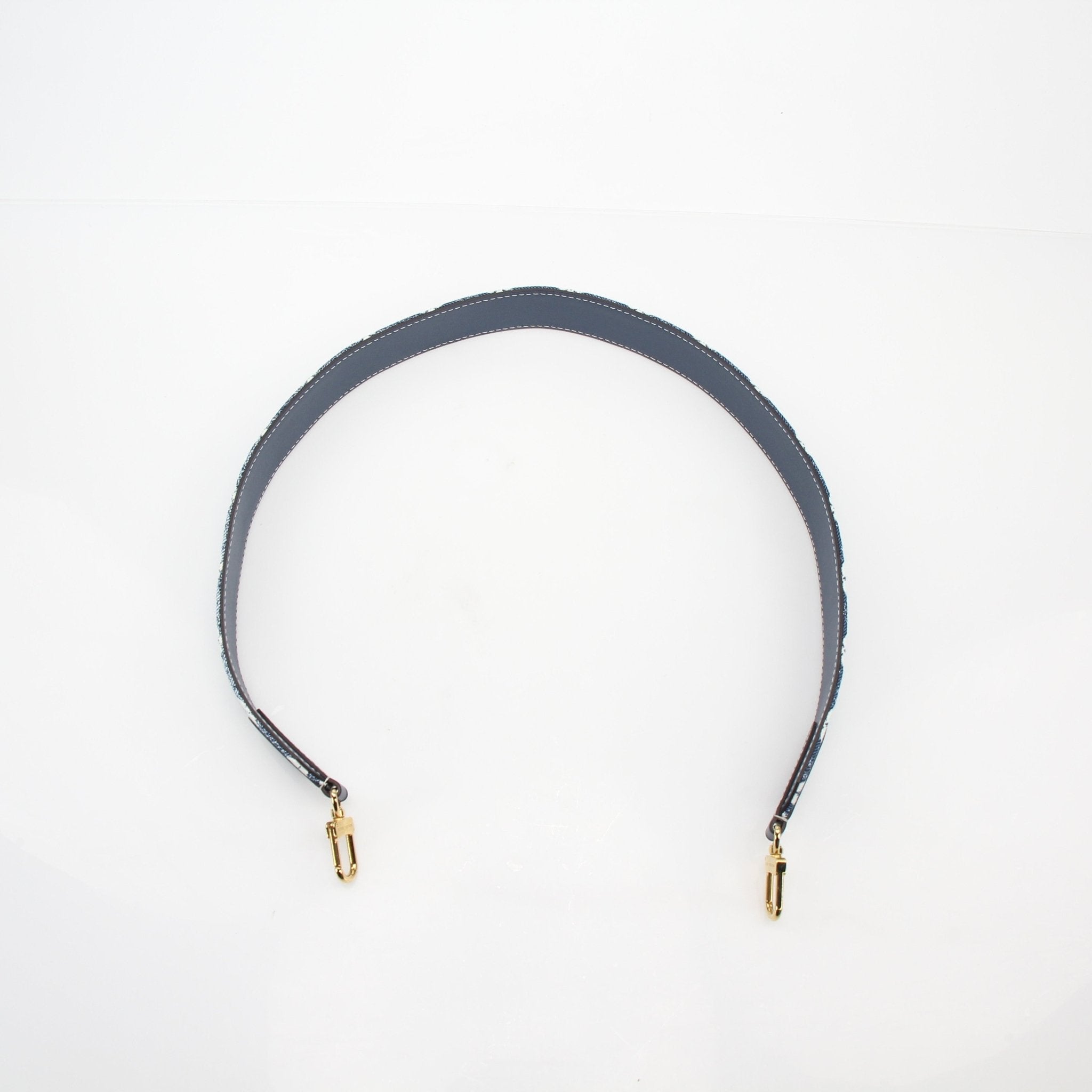 Blue denim Louis Vuitton Jacquard Bandoulière shoulder strap with gold accents, designed for luxury accessories and bag customization.