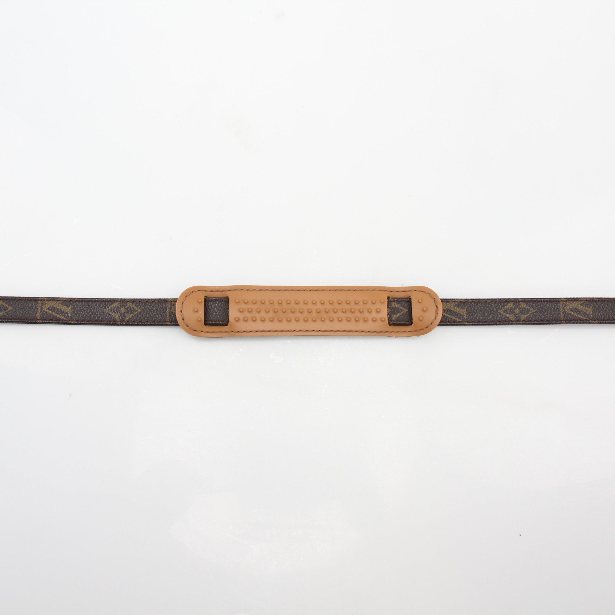 Louis Vuitton Monogram adjustable shoulder strap for accessories, featuring the iconic monogram pattern and gold hardware accents.