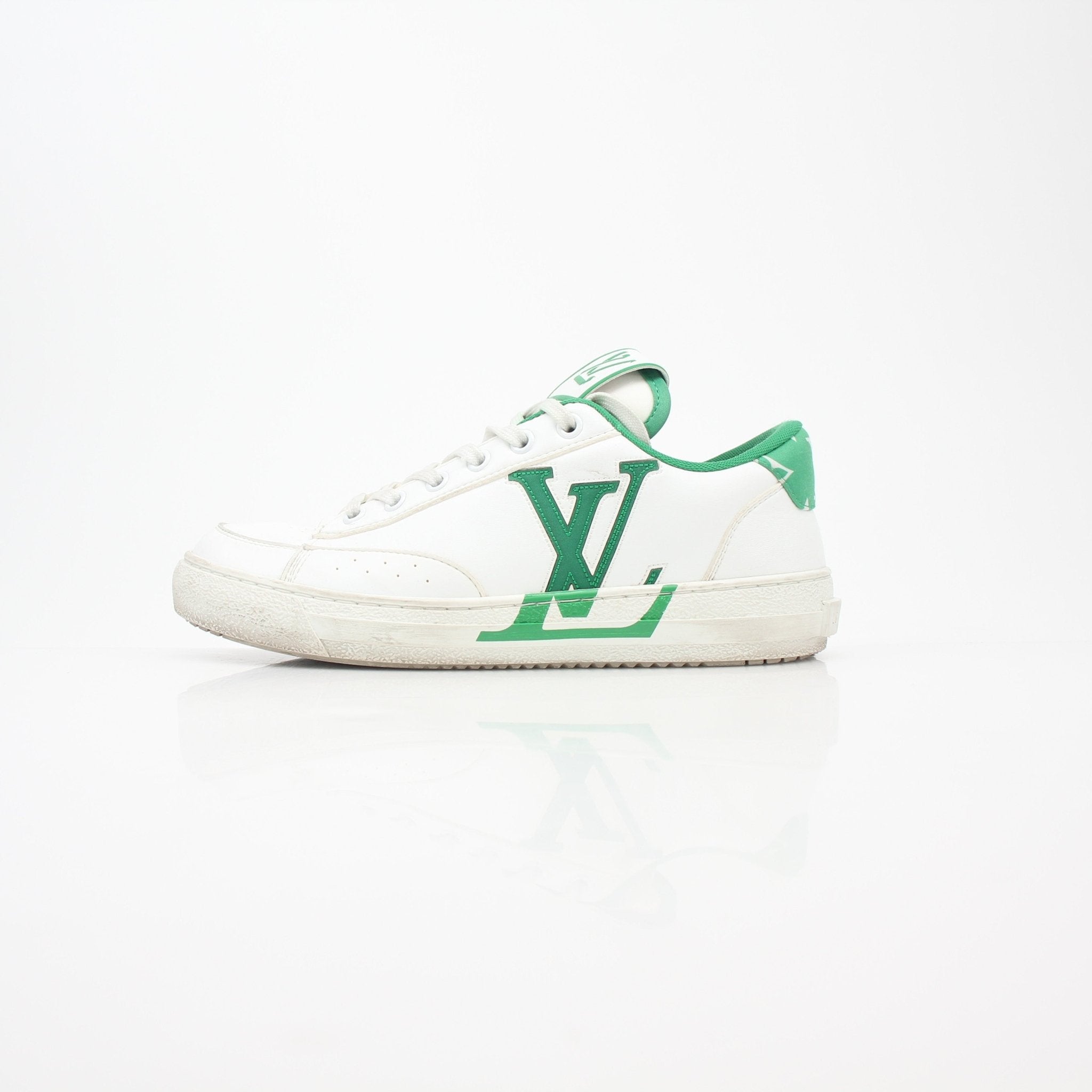 Louis Vuitton White and Green Charlie low-top sneakers by Gold & Beyond, featuring stylish design and contrasting color details.