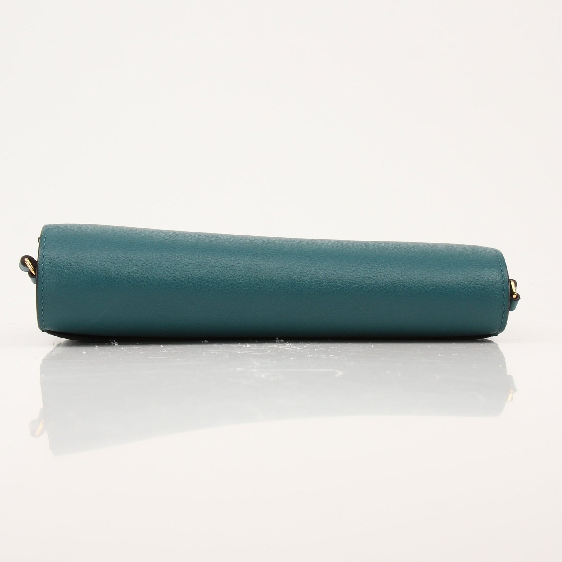 Hermès green Constance wallet on chain handbag with gold hardware, featuring a sleek, structured design and luxurious leather finish.