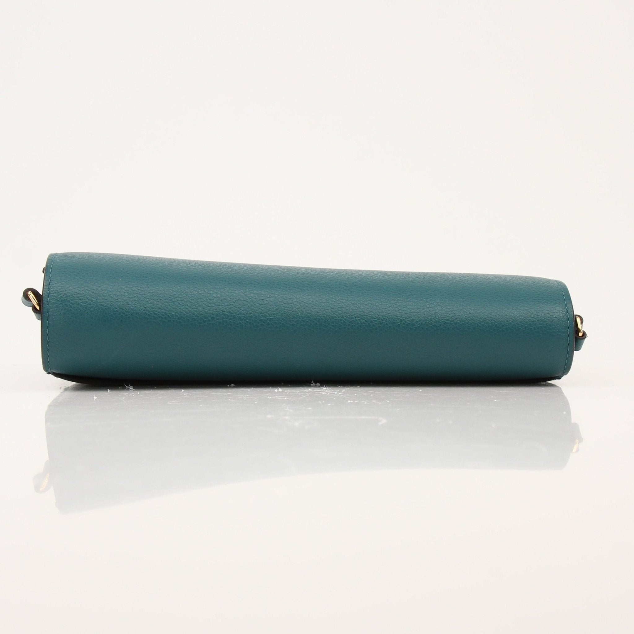 Hermès green Constance wallet on chain handbag with gold hardware, featuring a sleek, structured design and luxurious leather finish.