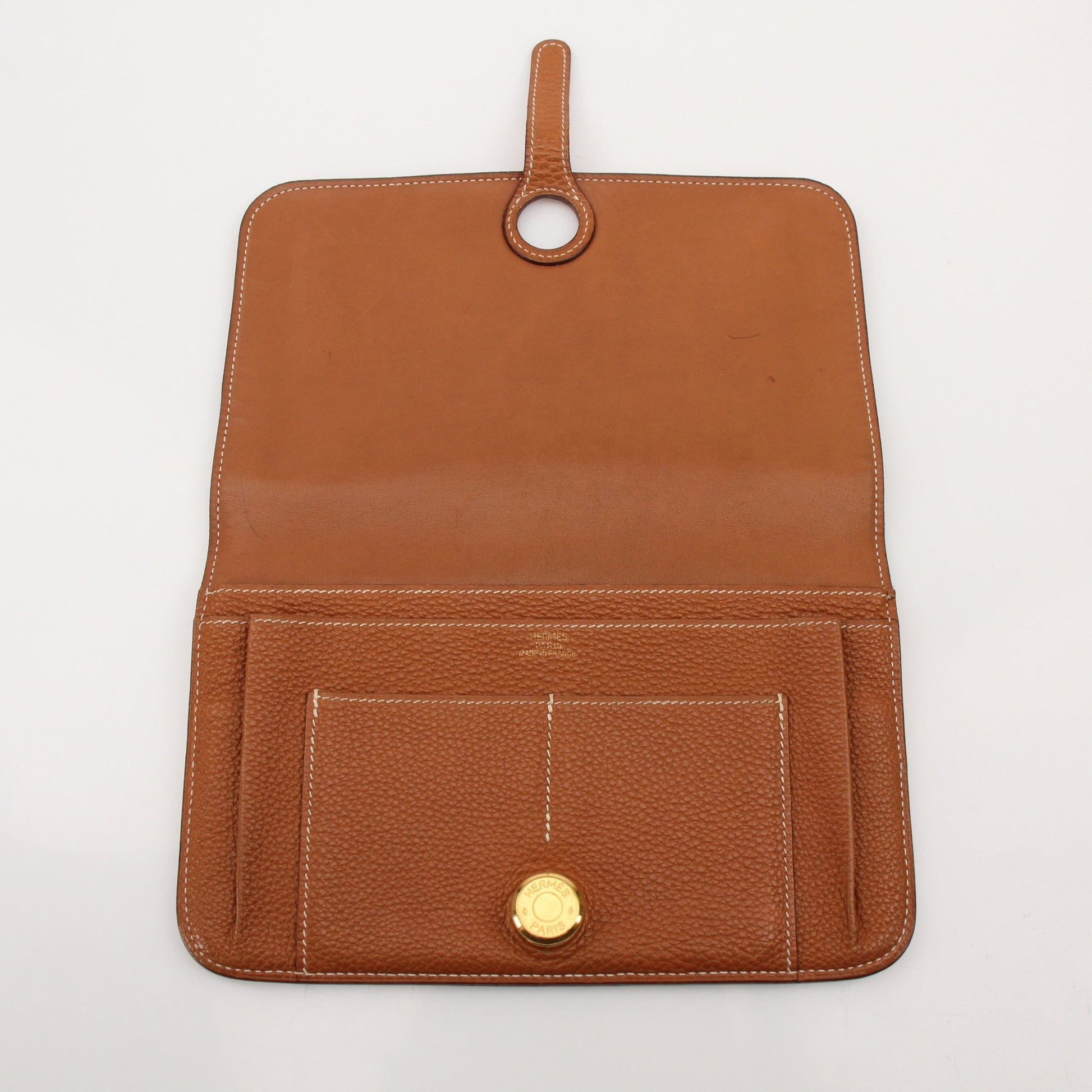 Hermès Brown Dogon Wallet by Gold & Beyond, featuring textured leather and compact design with multiple card slots.