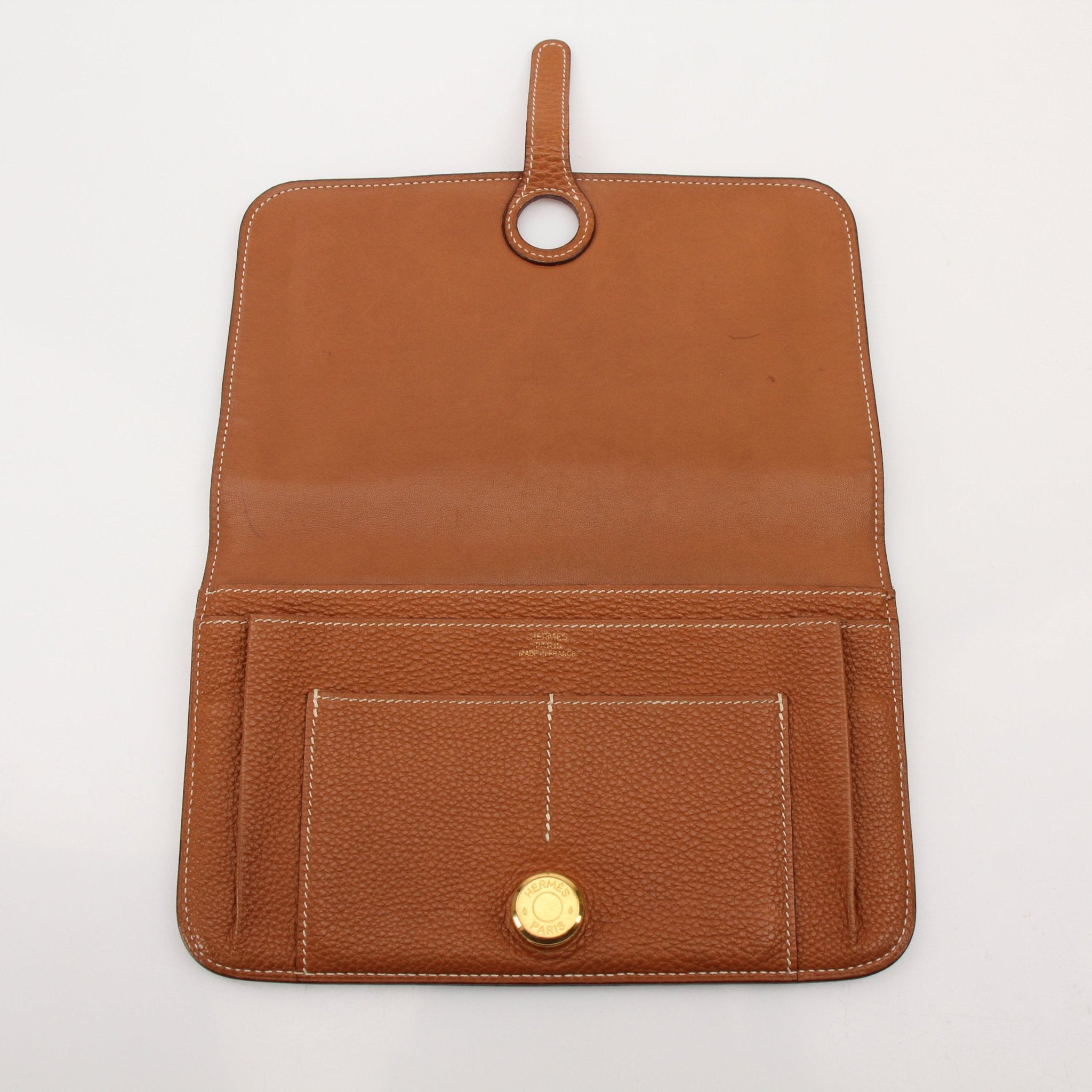 Hermès Brown Dogon Wallet by Gold & Beyond, featuring textured leather and compact design with multiple card slots.