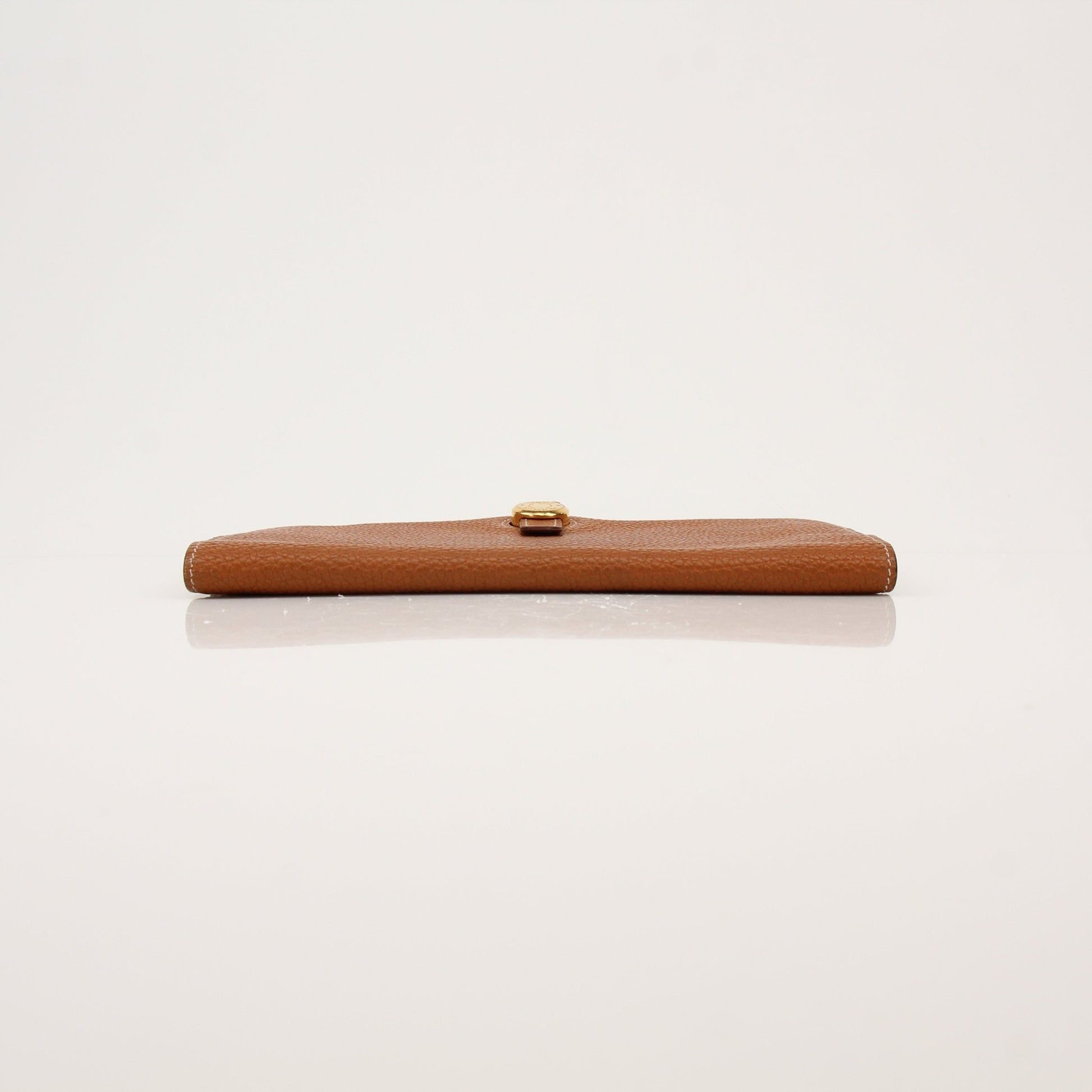 Hermès Brown Dogon wallet by Gold & Beyond, showcasing a stylish leather wallet with detailed craftsmanship and classic design.