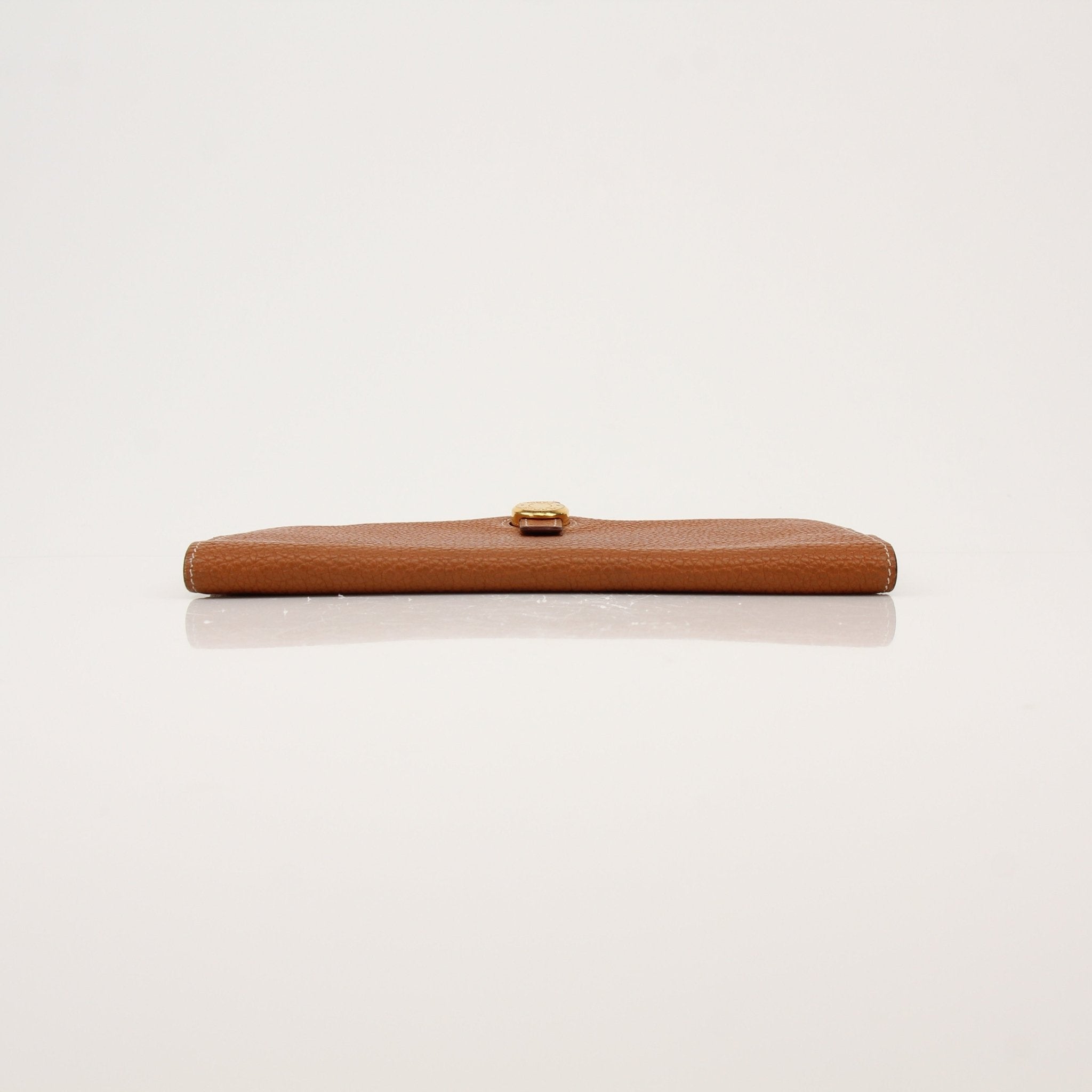 Hermès Brown Dogon wallet by Gold & Beyond, showcasing a stylish leather wallet with detailed craftsmanship and classic design.