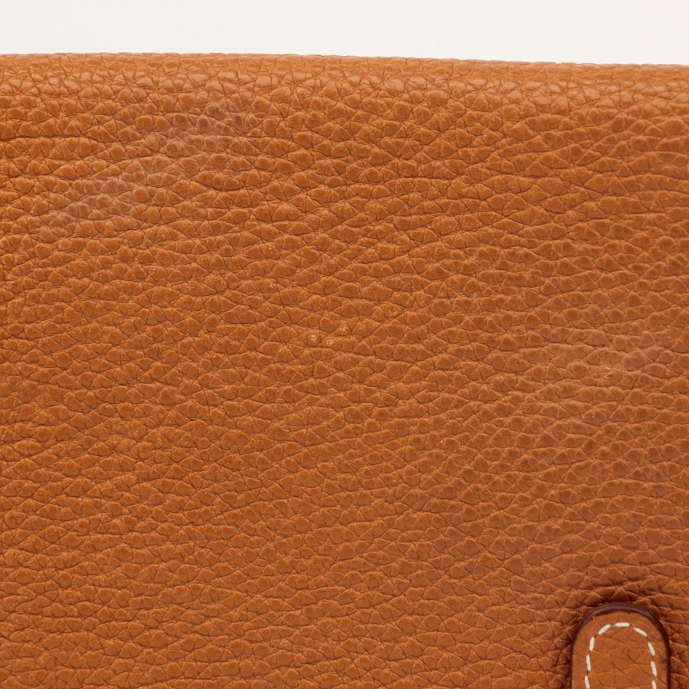 Hermès Brown Dogon Wallet by Gold & Beyond, featuring textured leather and compact design, ideal for stylish everyday use.