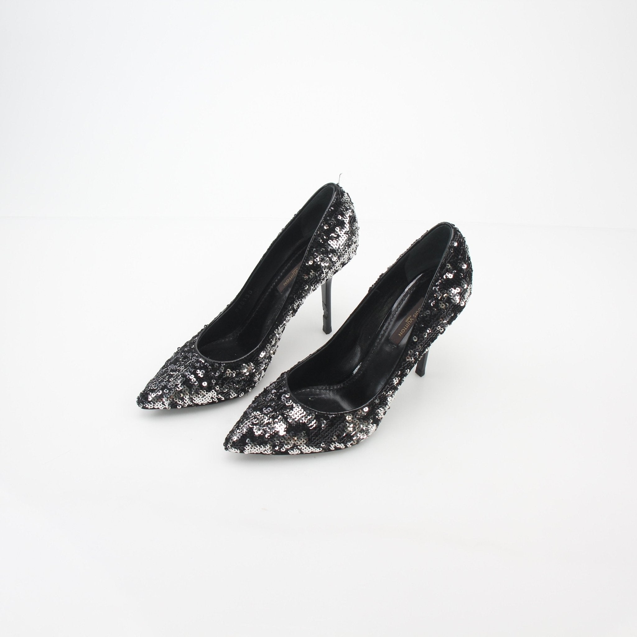 Louis Vuitton Liza sequin heels in black and silver with pointed toe and stiletto heel, designed by Gold & Beyond.
