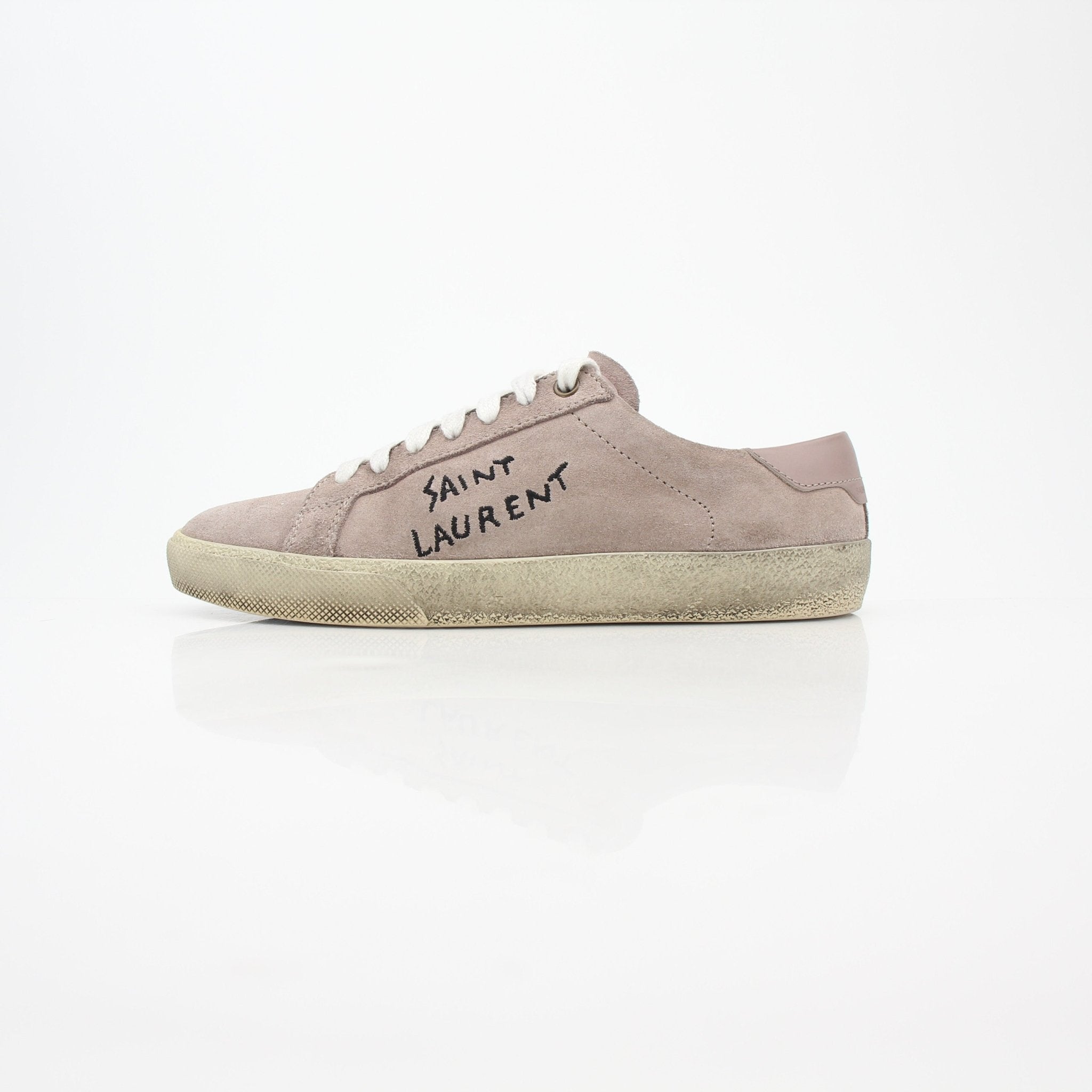 Gold & Beyond pink suede Saint Laurent Court Classic low-top sneakers featuring a sleek design and white rubber soles.
