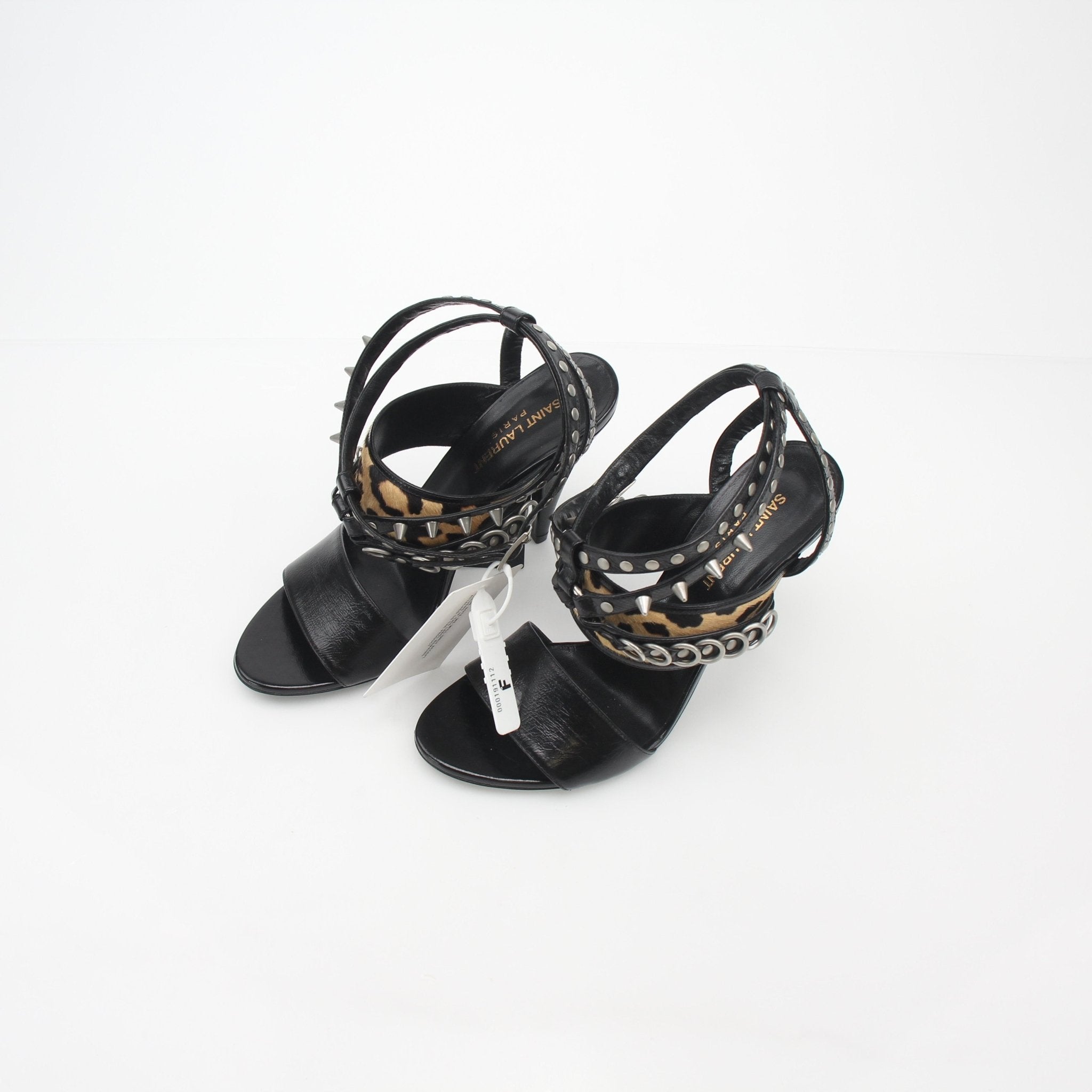 Gold & Beyond black studded leopard-print high-heel sandals from Saint Laurent with pointed toes and ankle straps.
