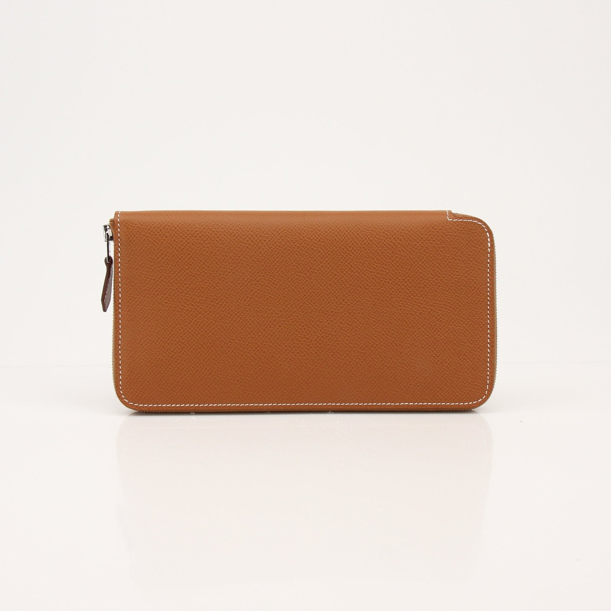 Hermès Brown Veau Epsom Silk In Wallet with gold accents, featuring a sleek leather design and multiple card slots.