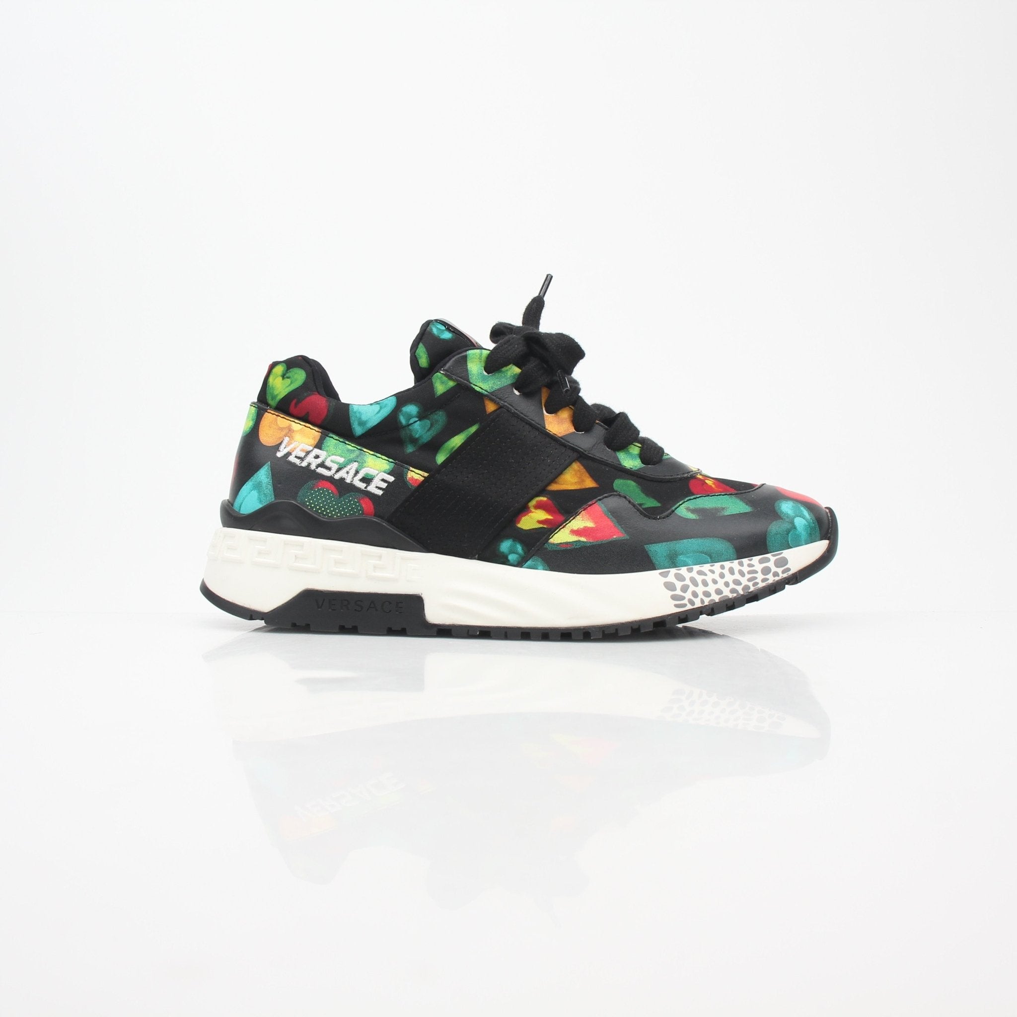 Gold & Beyond Versace multicolor heart-print Achilles low-top sneakers with stylish design and vibrant pattern.