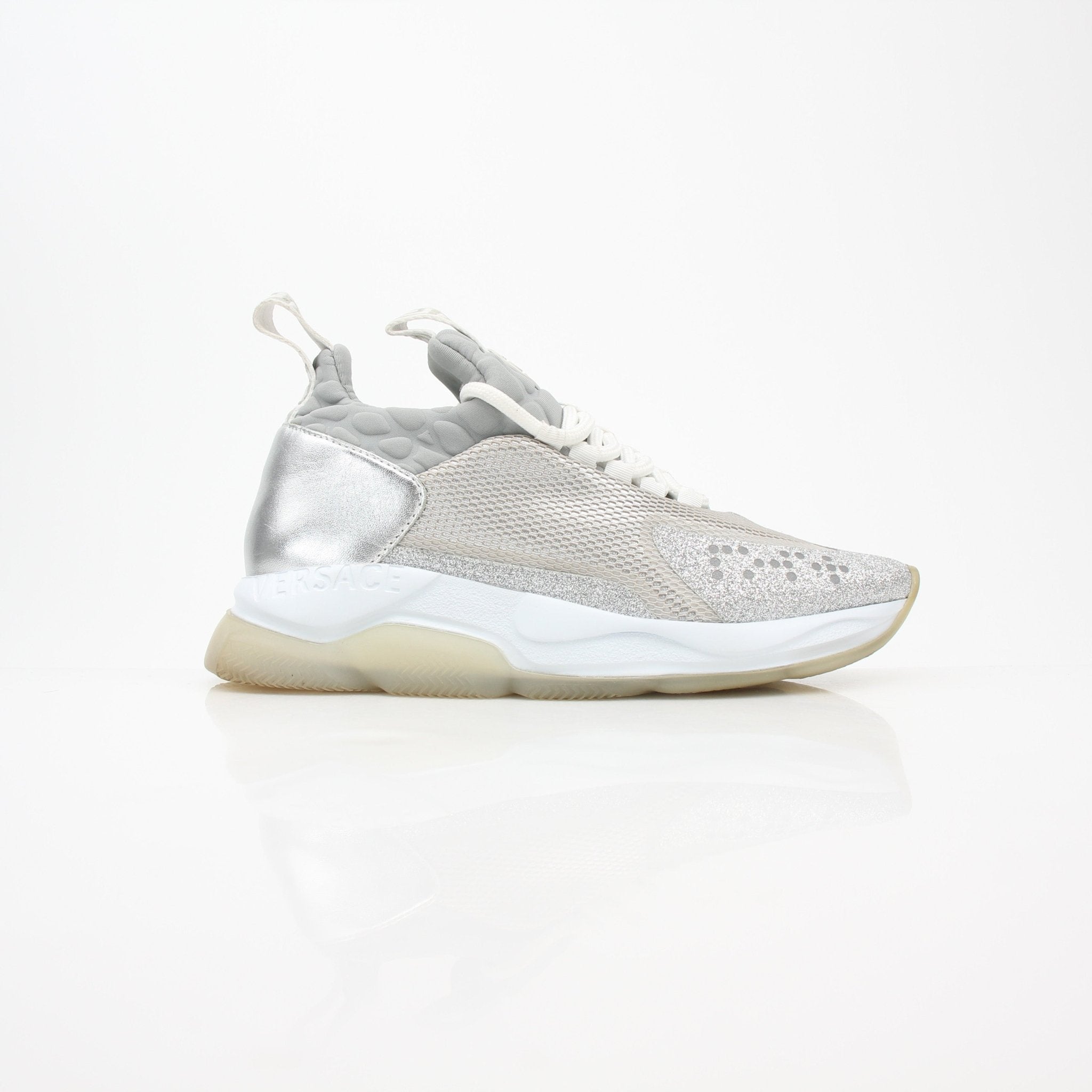 Versace Silver Chain Reaction low-top sneakers by Gold & Beyond, featuring sleek silver design and stylish athletic shoe details.