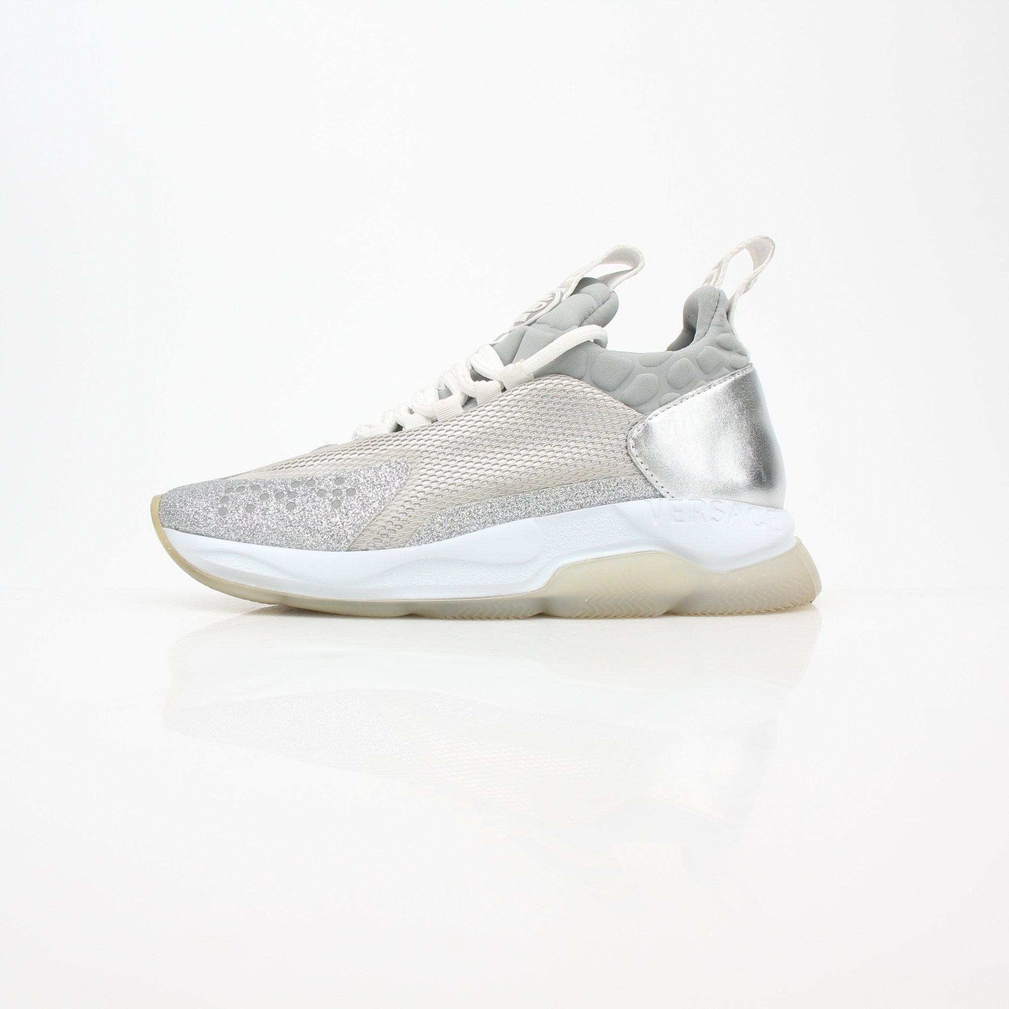Versace Silver Chain Reaction low-top sneakers by Gold & Beyond, featuring silver accents and sporty shoe design.