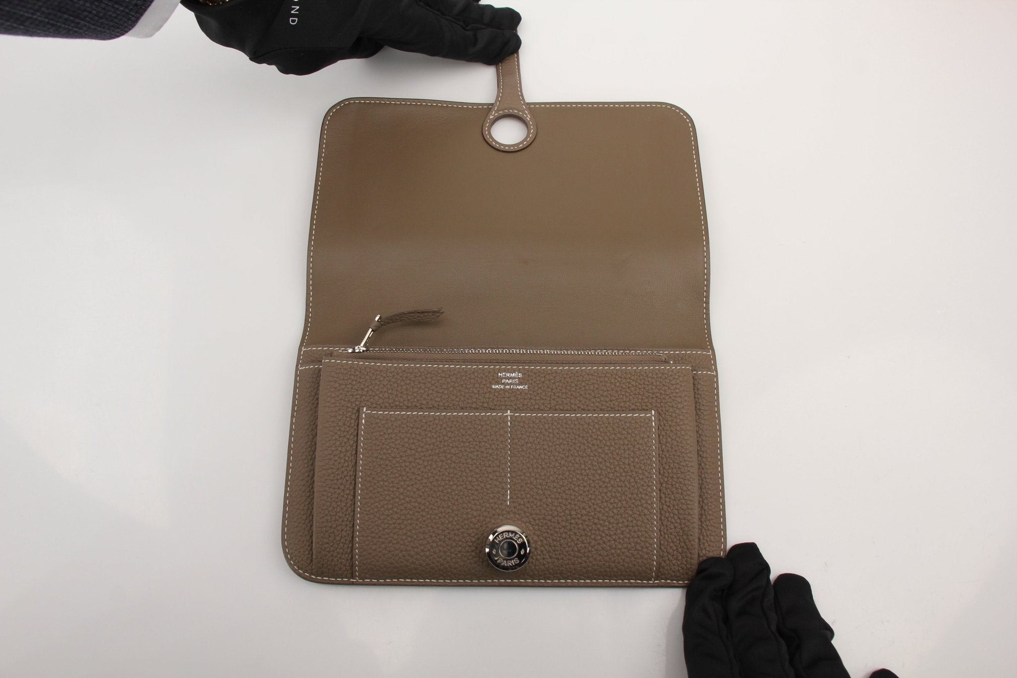 Hermès Dark Gray Dogon Duo Wallet by Gold & Beyond, featuring sleek leather design and multiple card slots.