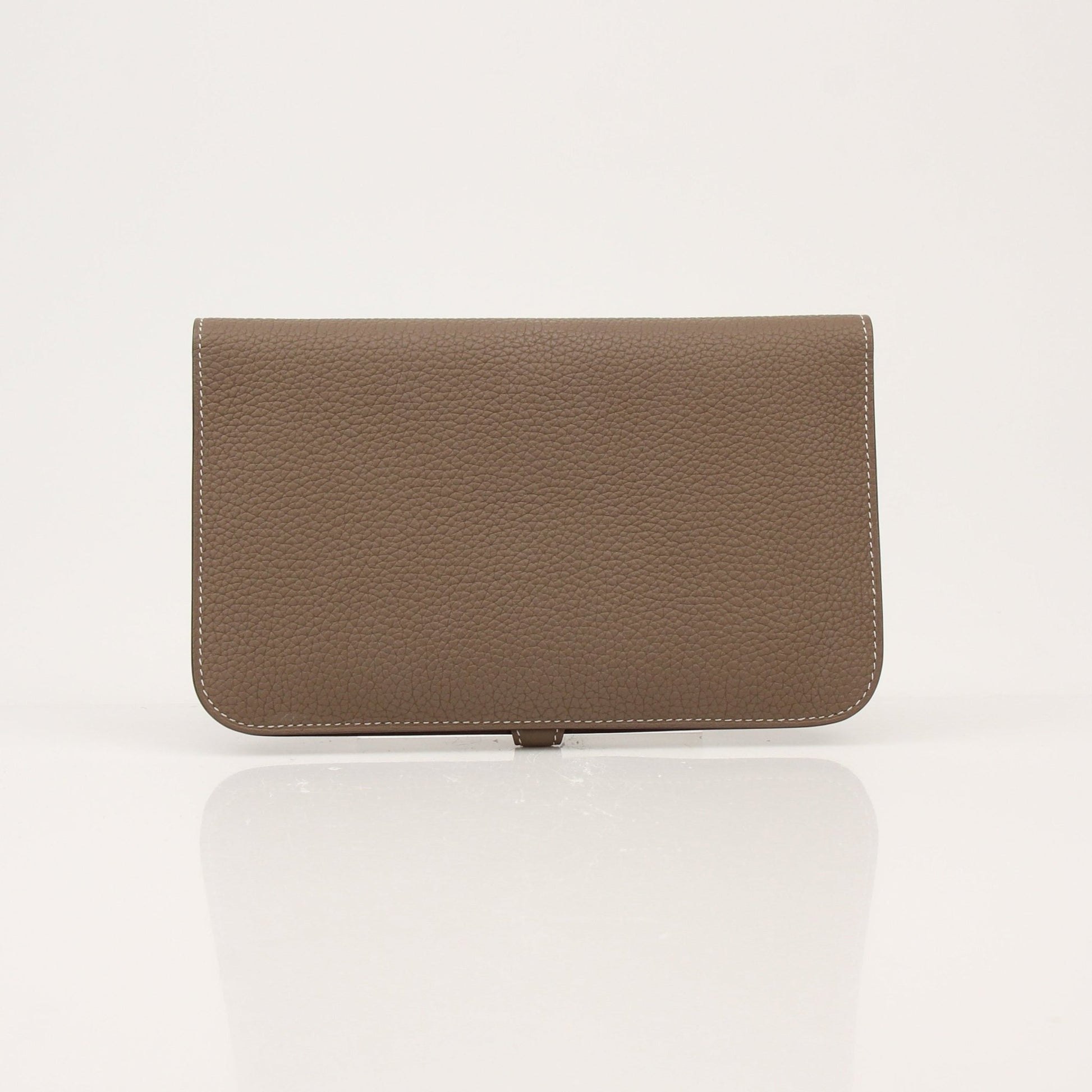 Hermès Dark Gray Dogon Duo Wallet by Gold & Beyond showing textured leather and compact design with multiple card slots.