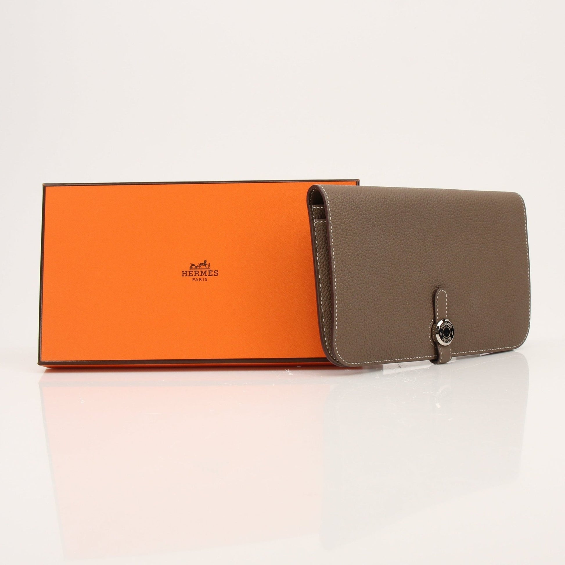 Hermès Dark Gray Dogon Duo Wallet by Gold & Beyond, showcasing sleek leather design and compact wallet features.