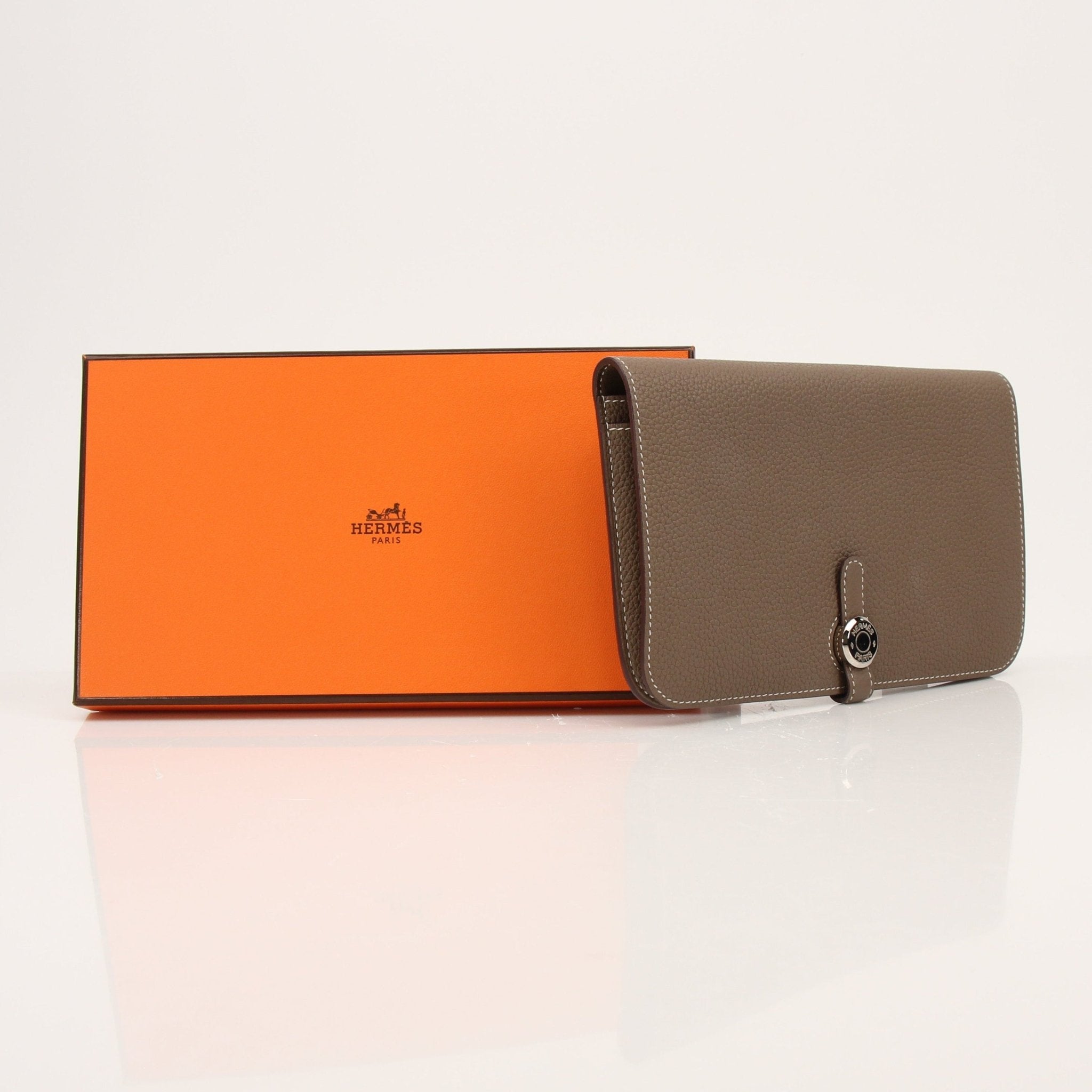 Hermès Dark Gray Dogon Duo Wallet by Gold & Beyond, showcasing sleek leather design and compact wallet features.