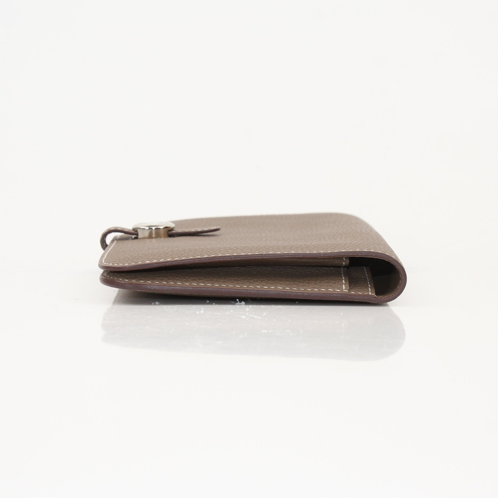Hermès Dark Gray Dogon Duo Wallet by Gold & Beyond, featuring sleek leather design and multiple card slots.