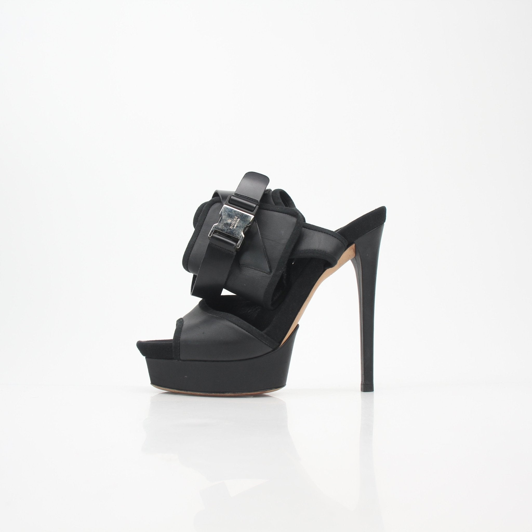 Gucci Black Babylon platform sandals with chunky heels and ankle straps, displayed on a white background.