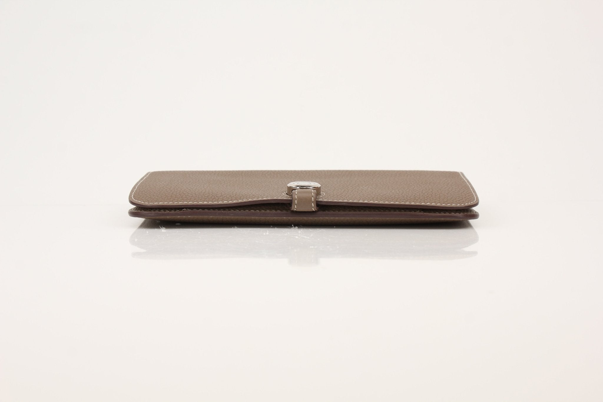 Hermès Dark Gray Dogon Duo Wallet by Gold & Beyond, featuring sleek leather design and compact organization for everyday use.