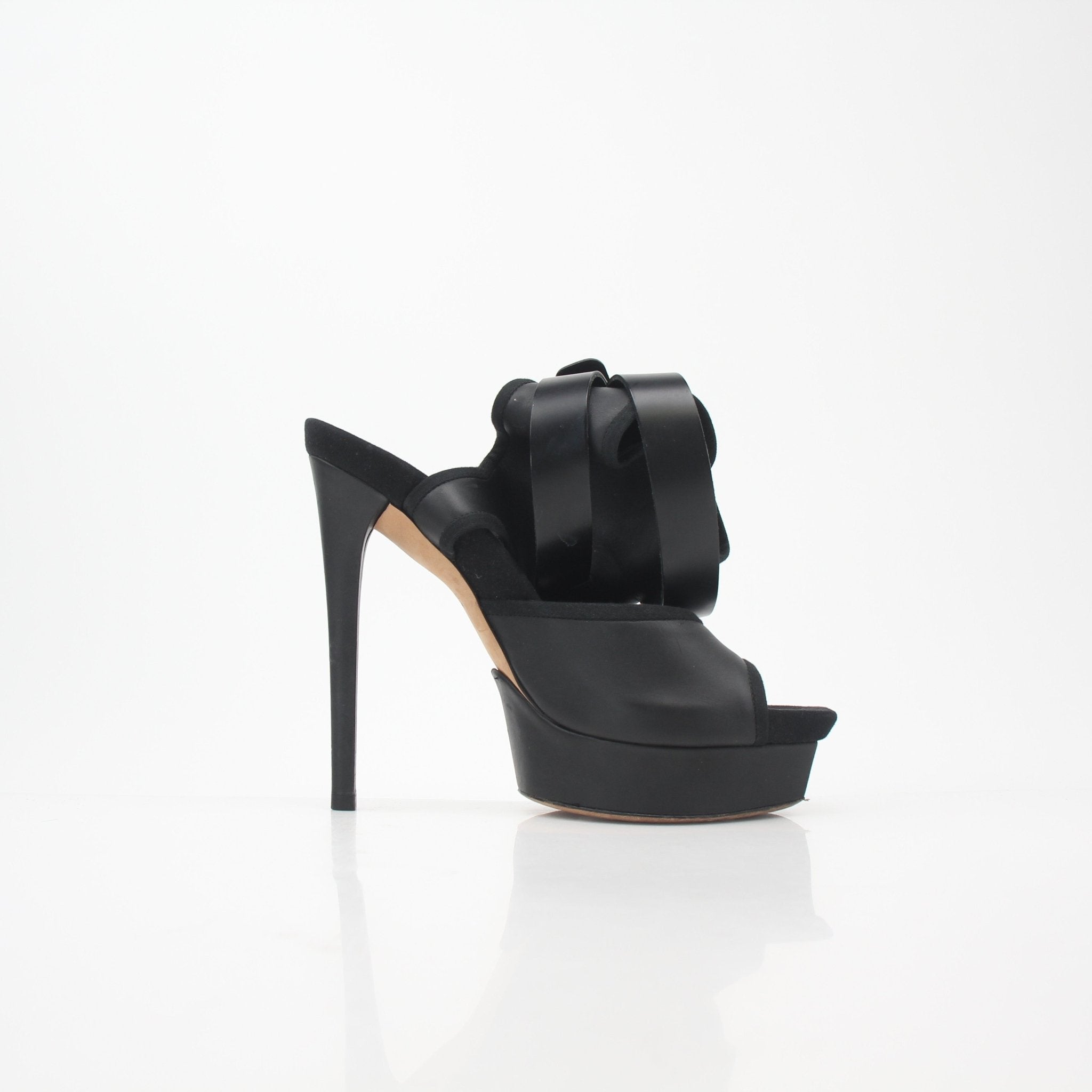 Gucci Black Babylon Platform Sandals heels with chunky soles and ankle straps, featuring gold accents and stylish design.