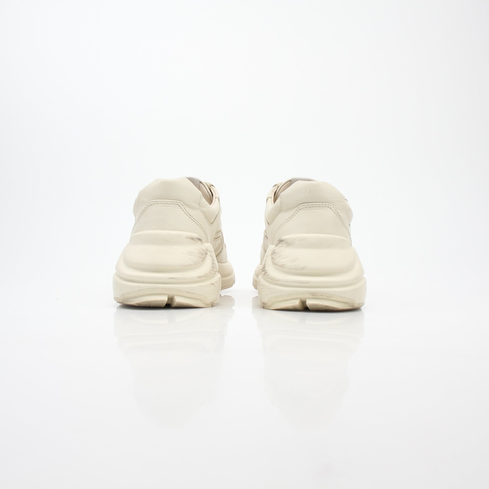 Gucci Ivory Rhyton Lemon low-top sneakers with gold accents, casual shoes for men and women.