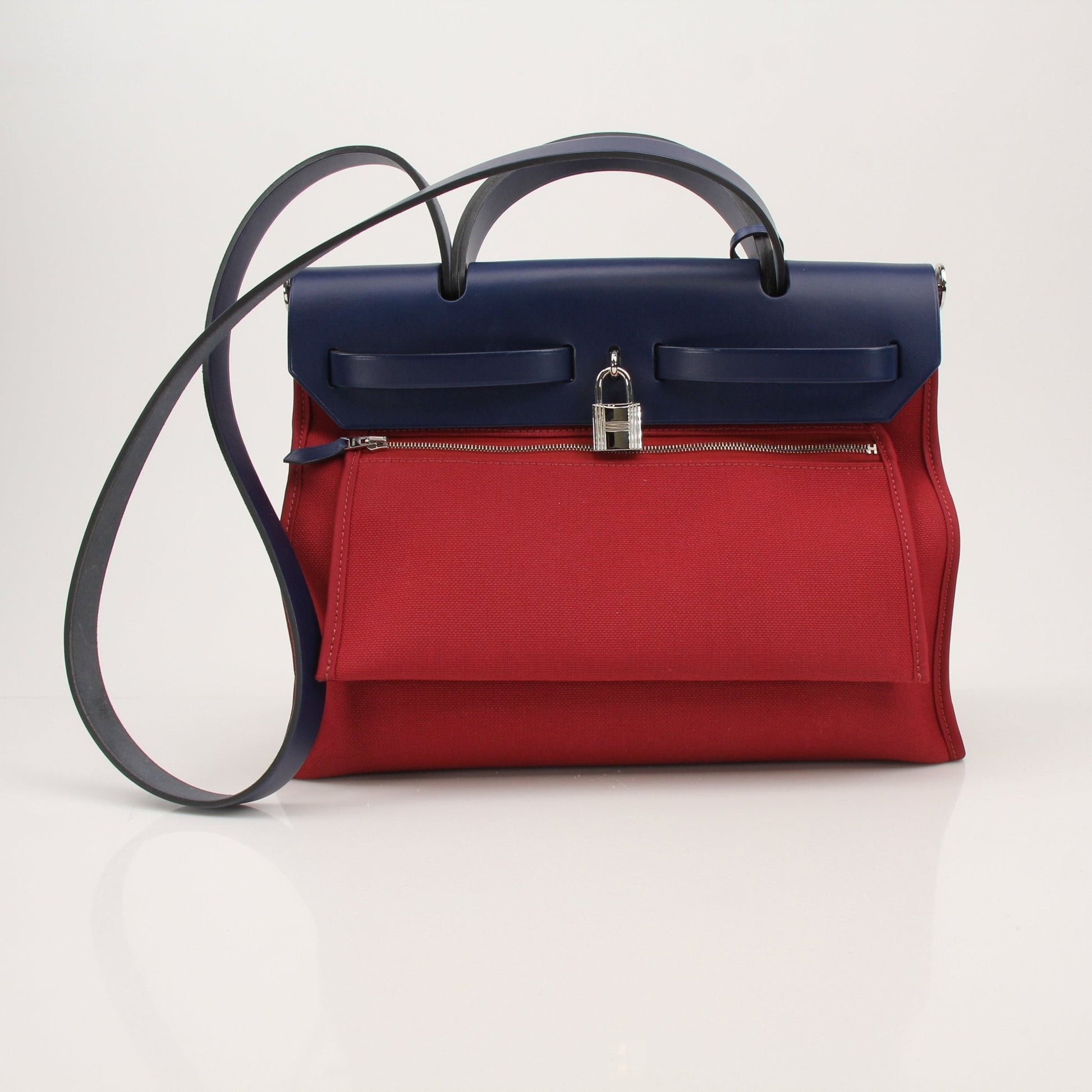 Hermès Herbag handbag by Gold & Beyond, showcasing a stylish leather and canvas handbag with top handles and classic design.