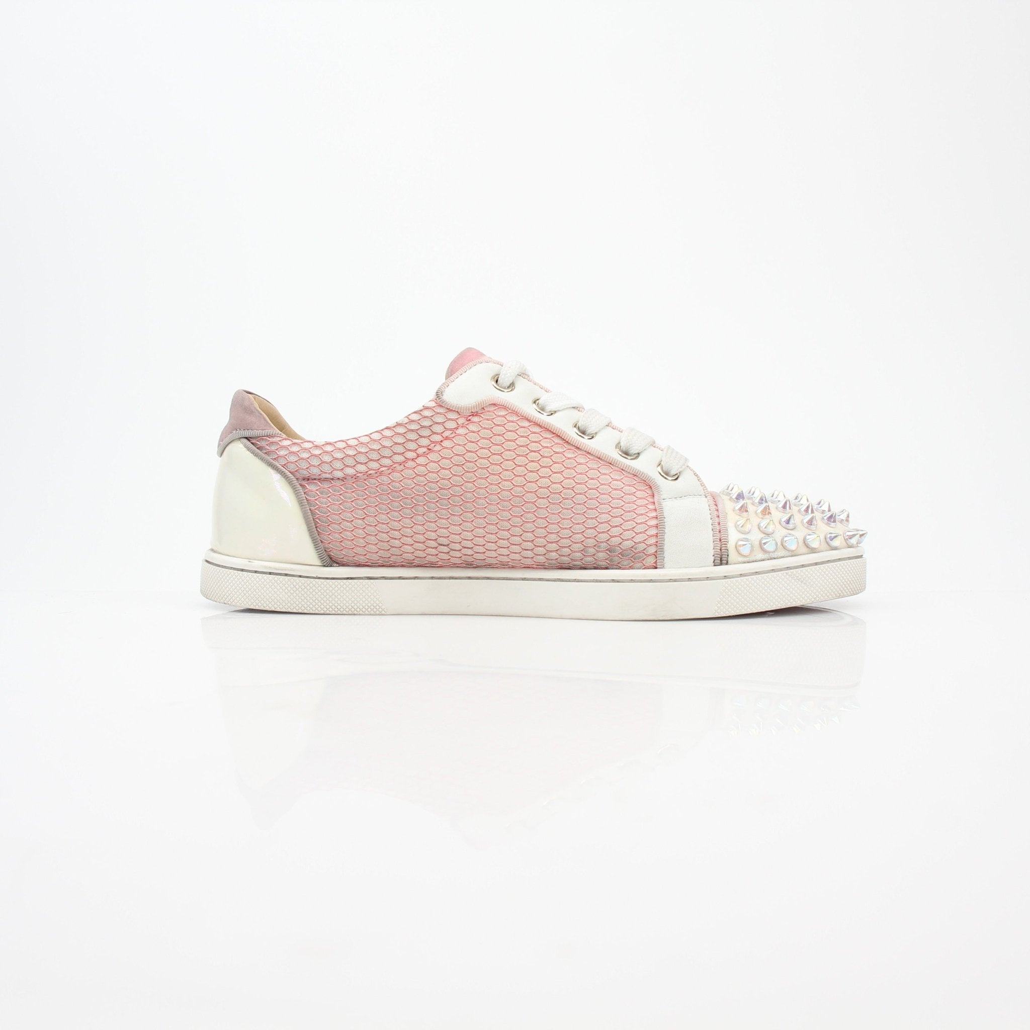 Pink Christian Louboutin Gondolita Spikes low-top sneakers with studded accents, stylish shoes from Gold & Beyond.