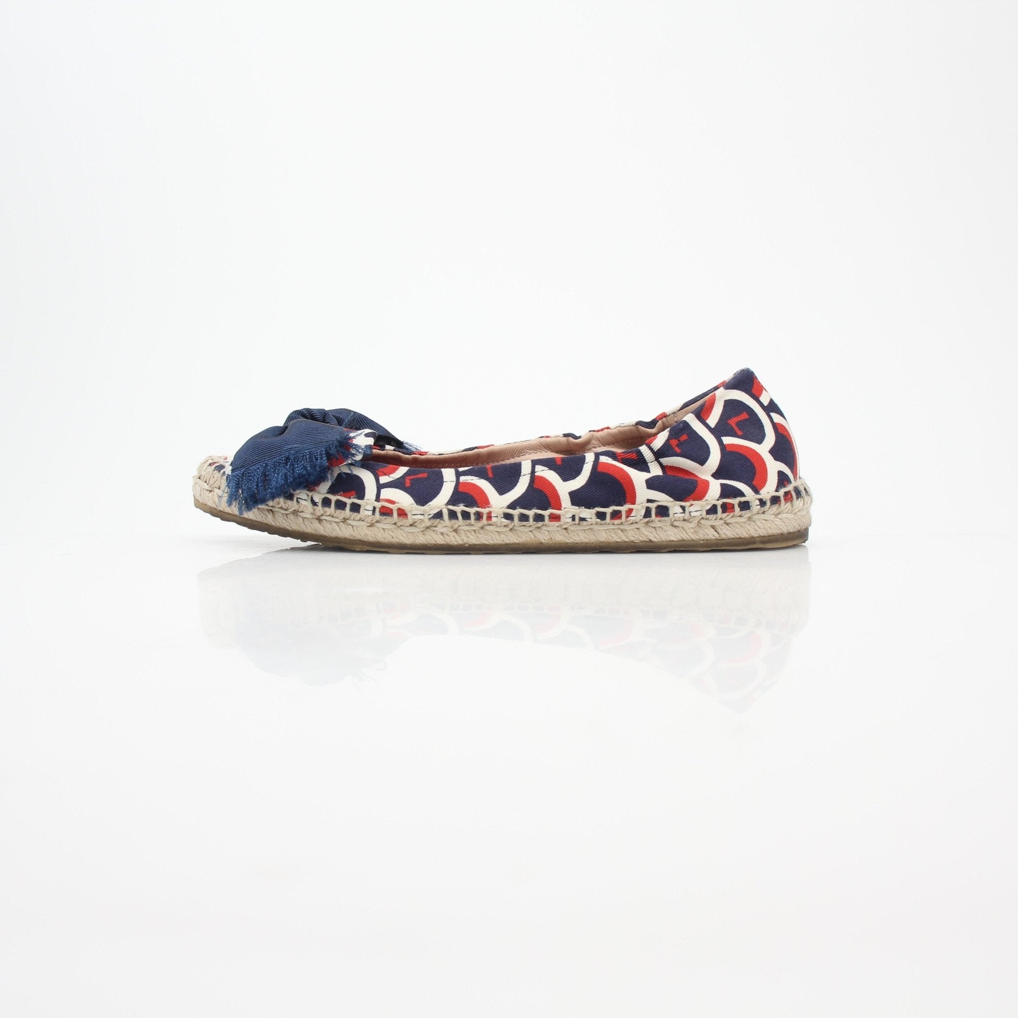 Gold & Beyond Valentino Garavani navy bow ballerina espadrille flats with ribbon detail on soft fabric upper.