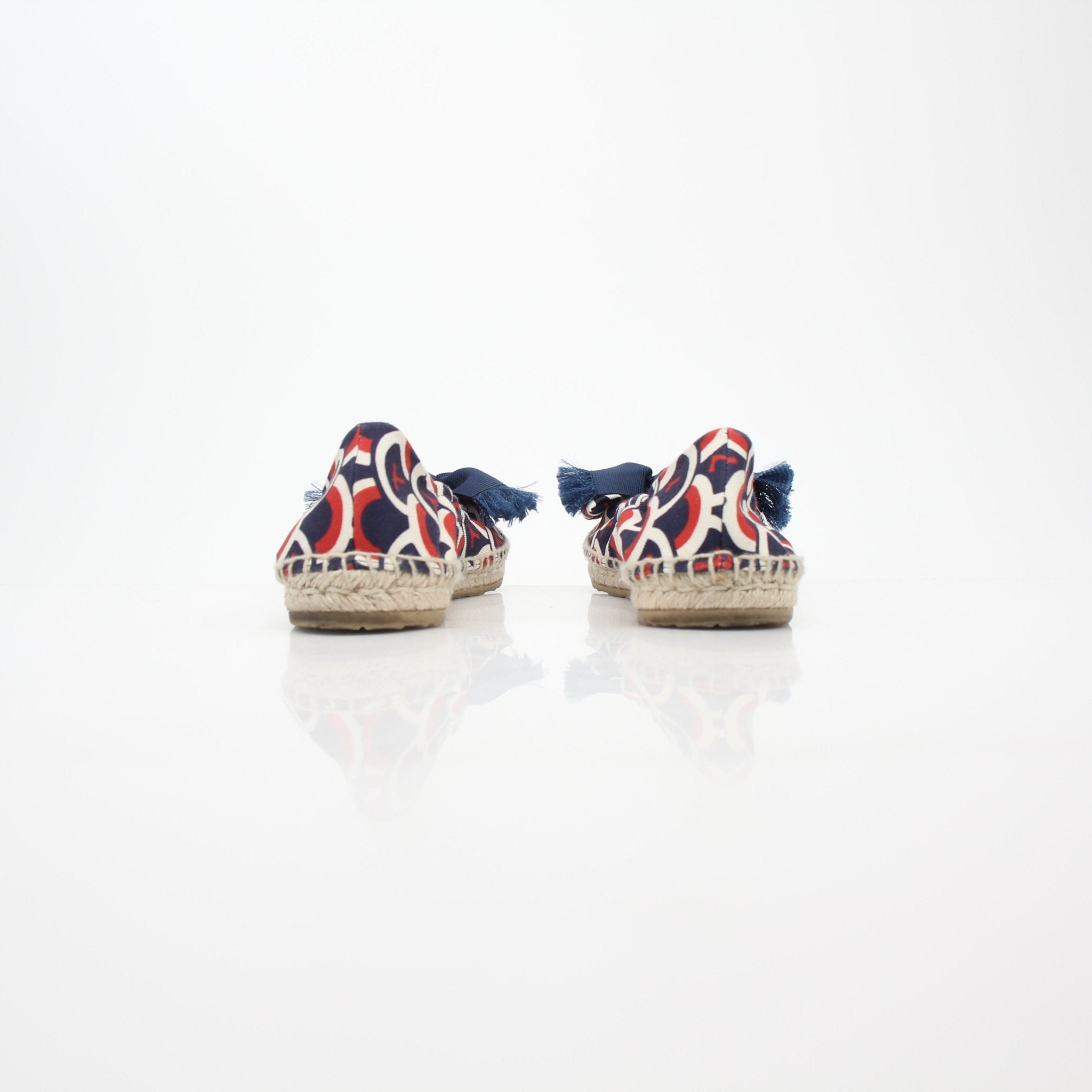 Gold & Beyond Valentino Garavani navy bow ballerina espadrille flats with woven jute sole and elegant bow detail on the toe.
