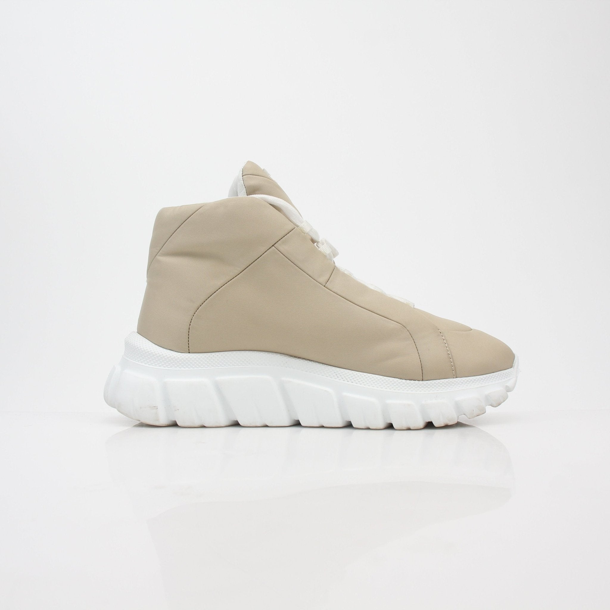 Gold & Beyond Prada Beige Rush Piuma high-top sneakers with beige leather and stylish design, visible laces and sole details.