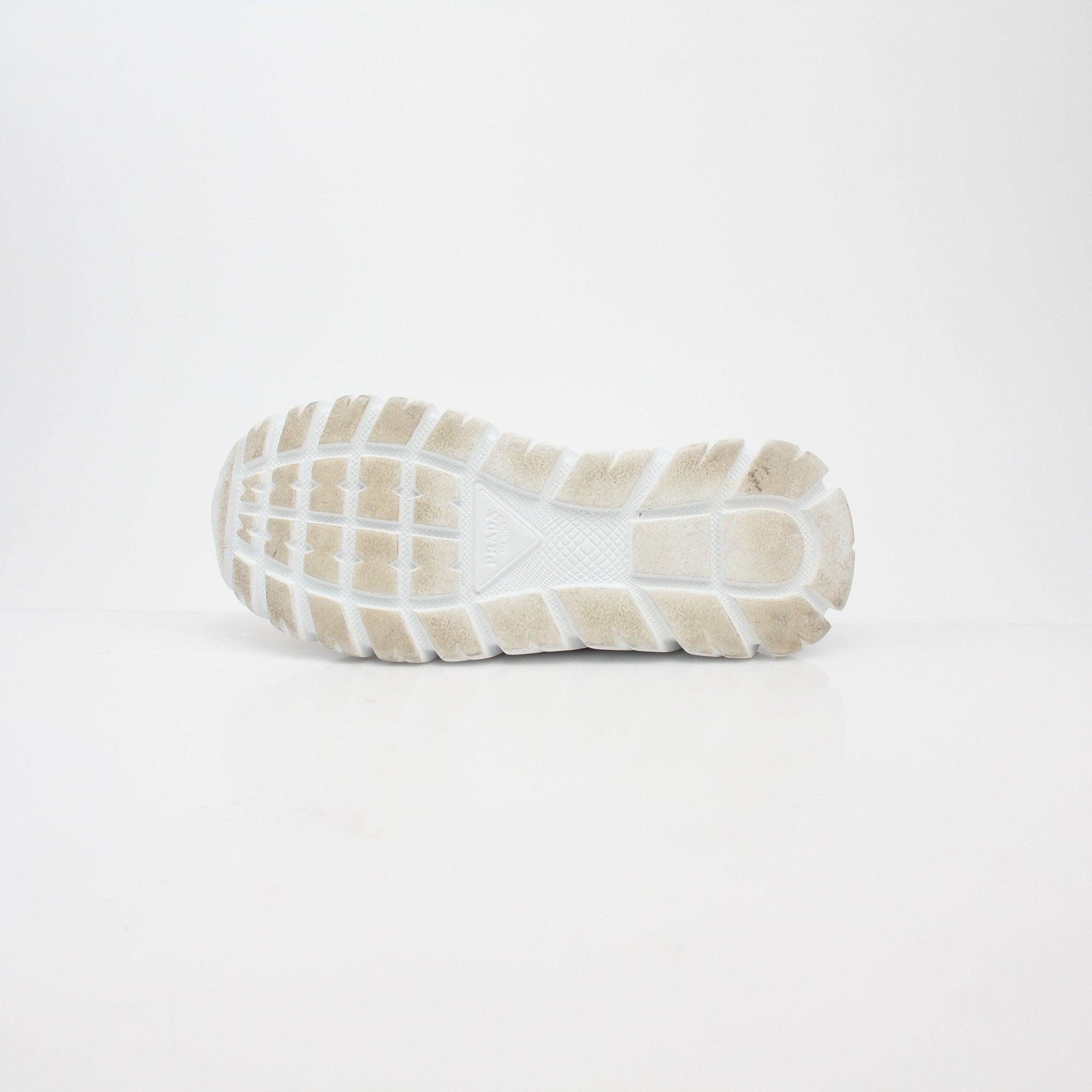 Prada beige Rush Piuma high-top sneakers with textured details, showcasing stylish shoes from Gold & Beyond.