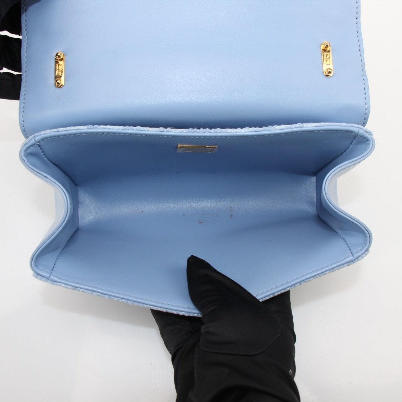 Light blue Dolce Gabbana DG Girl shoulder handbag in tweed fabric, stylish and elegant for casual or formal wear.