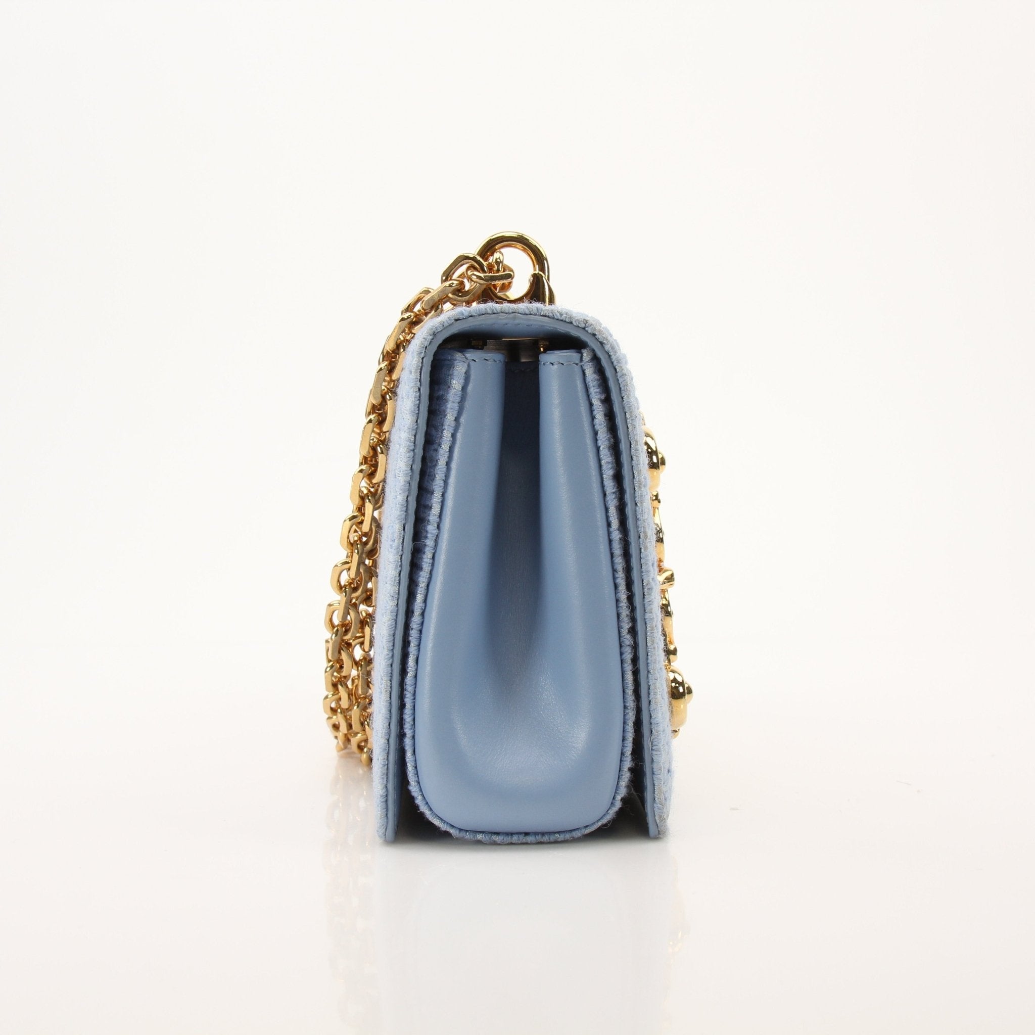 Light blue Dolce Gabbana DG Girl shoulder handbag with tweed fabric, featuring a stylish and elegant design.