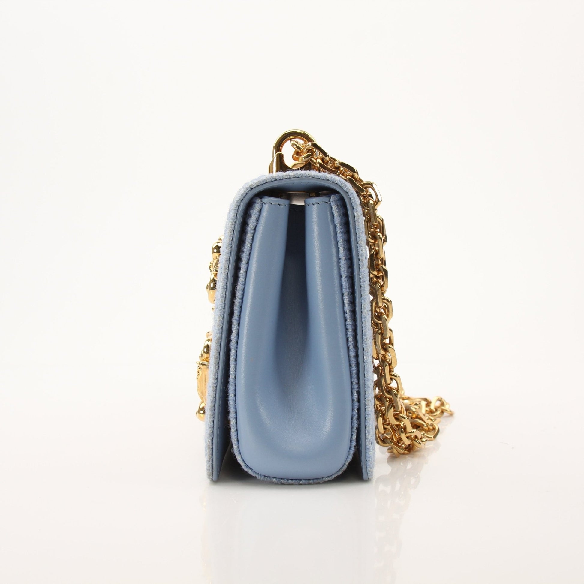 Light blue Dolce Gabbana DG Girl shoulder handbag with tweed fabric, stylish and elegant for fashionable wear.