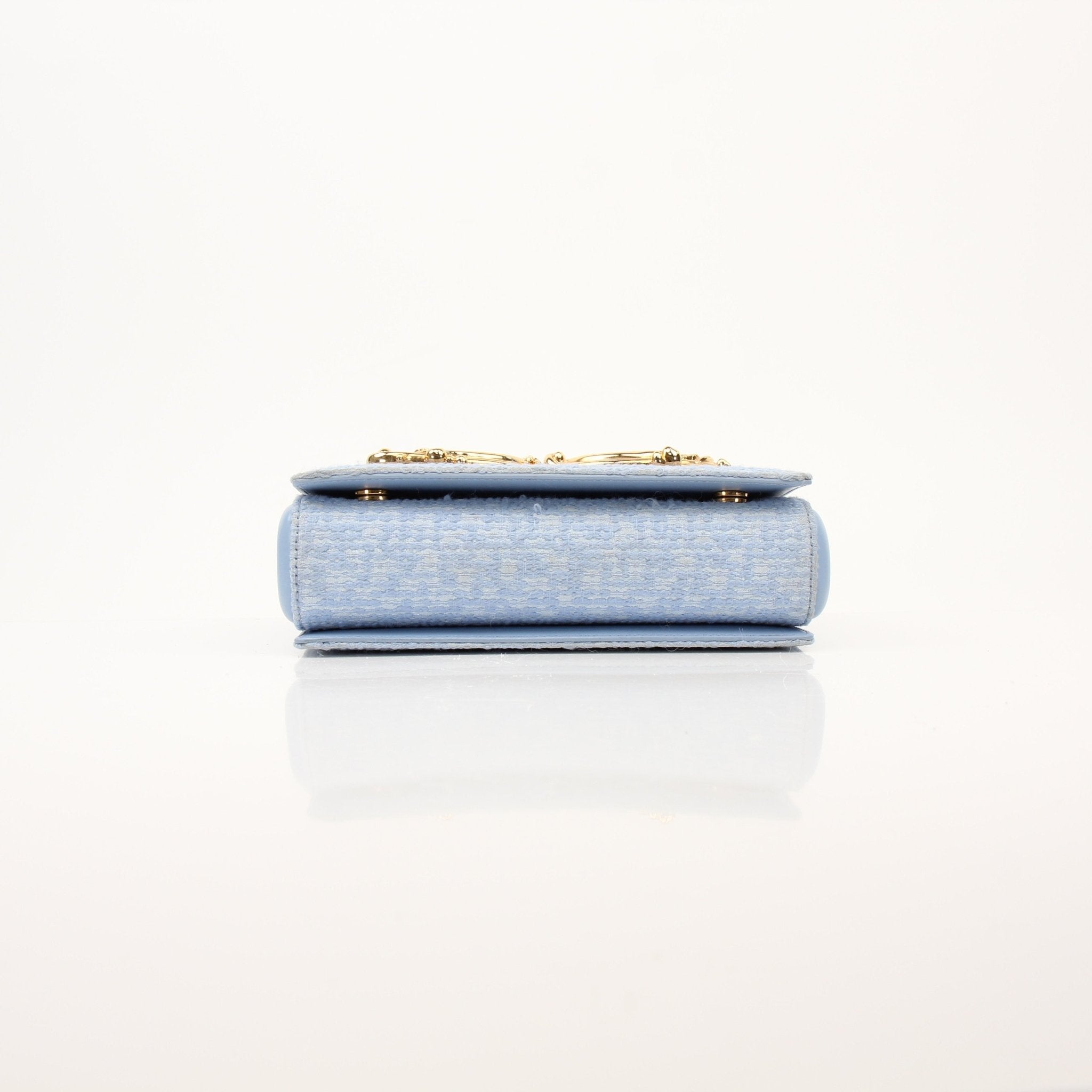 Light blue Dolce Gabbana DG Girl shoulder handbag with tweed fabric, featuring a stylish and elegant design.